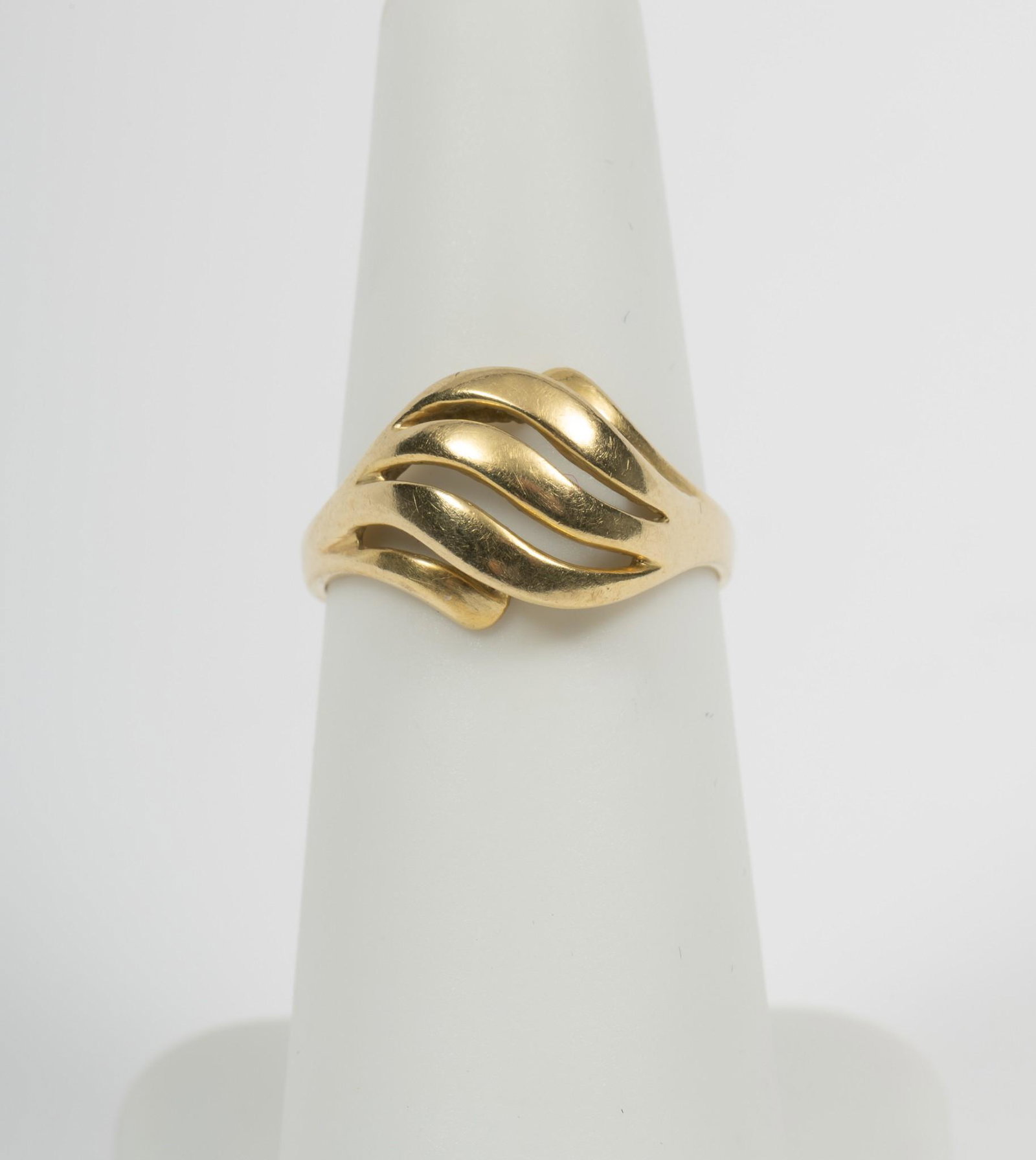 18k Yellow Gold Ring: Stamped 18k. Size 5. 1/2" wide. 1.9 dwt. AJ/MH IMPORTANT: Before bidding, please read the terms and conditions. When you registered for the auction you agreed to these terms and will be required 