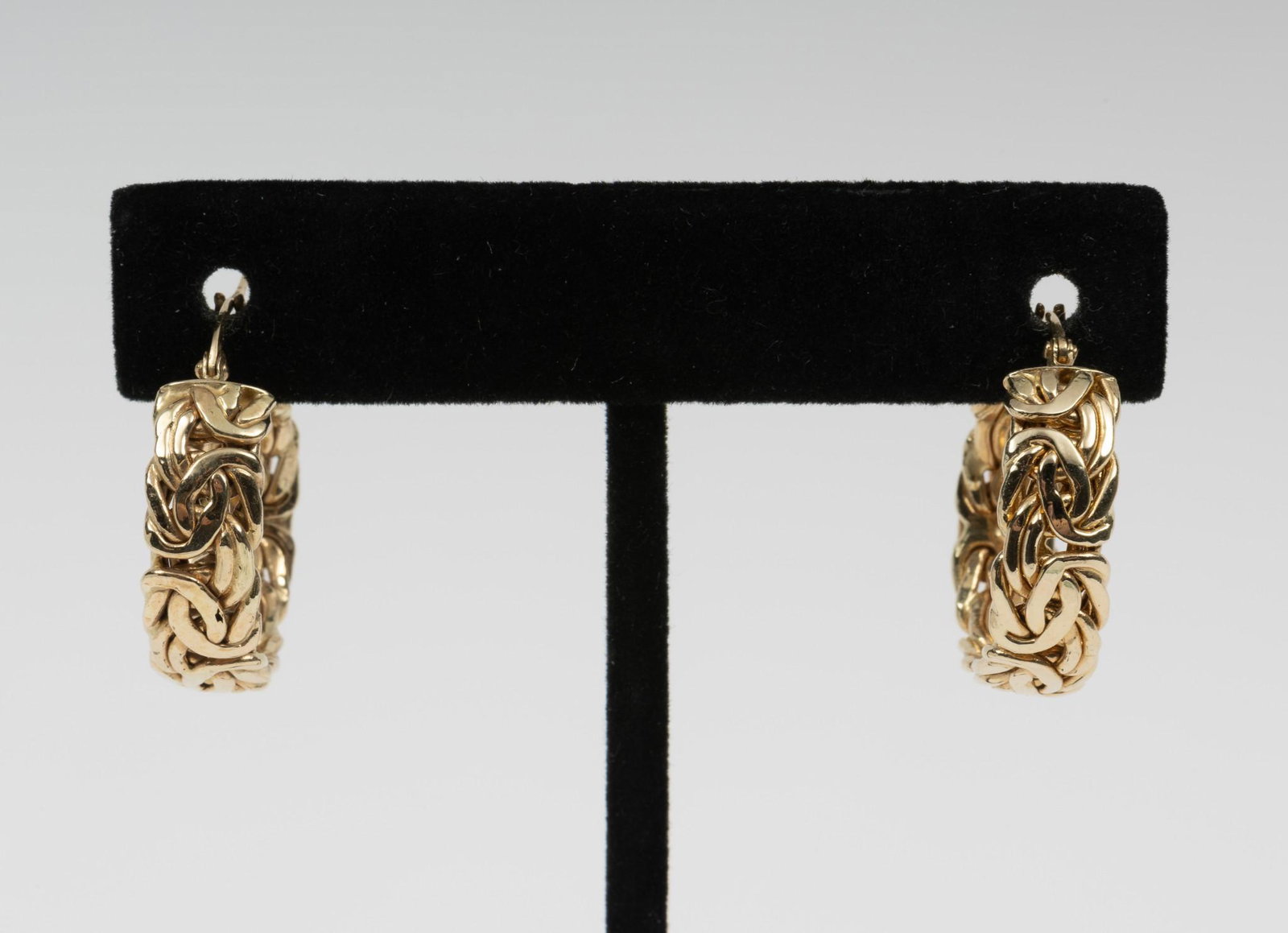 14k Turkish Gold Hoop Earrings: Stamped 14k Turkey. 3/4" long, 1/4" wide. 3.5 dwt. AJ/MH. IMPORTANT: Before bidding, please read the terms and conditions. When you registered for the auction you agreed to these terms and will be req