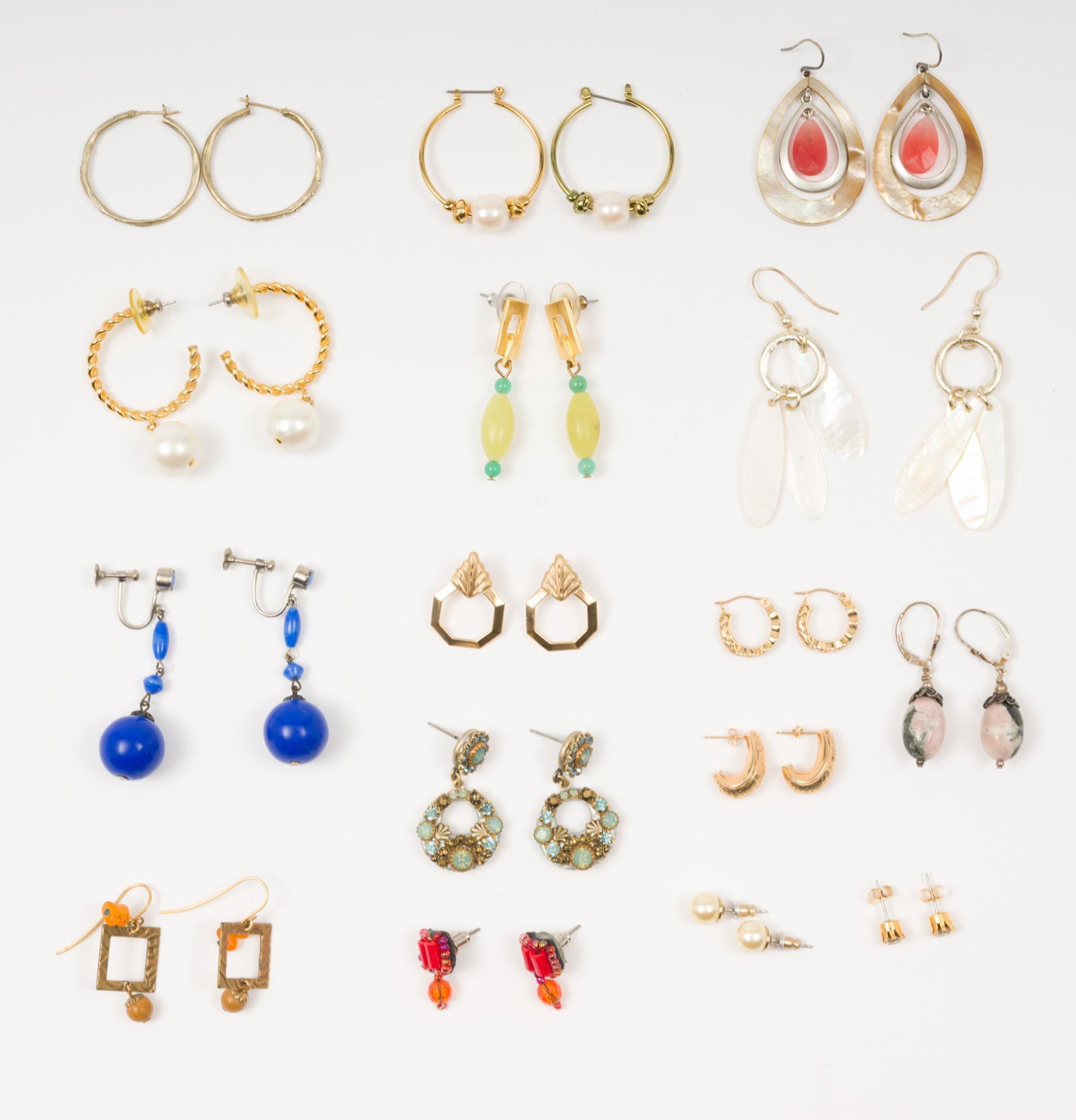 17 Pairs Of Costume Earrings Incl. Mother Of Pearl & Jasper: 1/4" to 1-3/8" long. AJ/MH IMPORTANT: Before bidding, please read the terms and conditions. When you registered for the auction you agreed to these terms and will be required to comply with them.