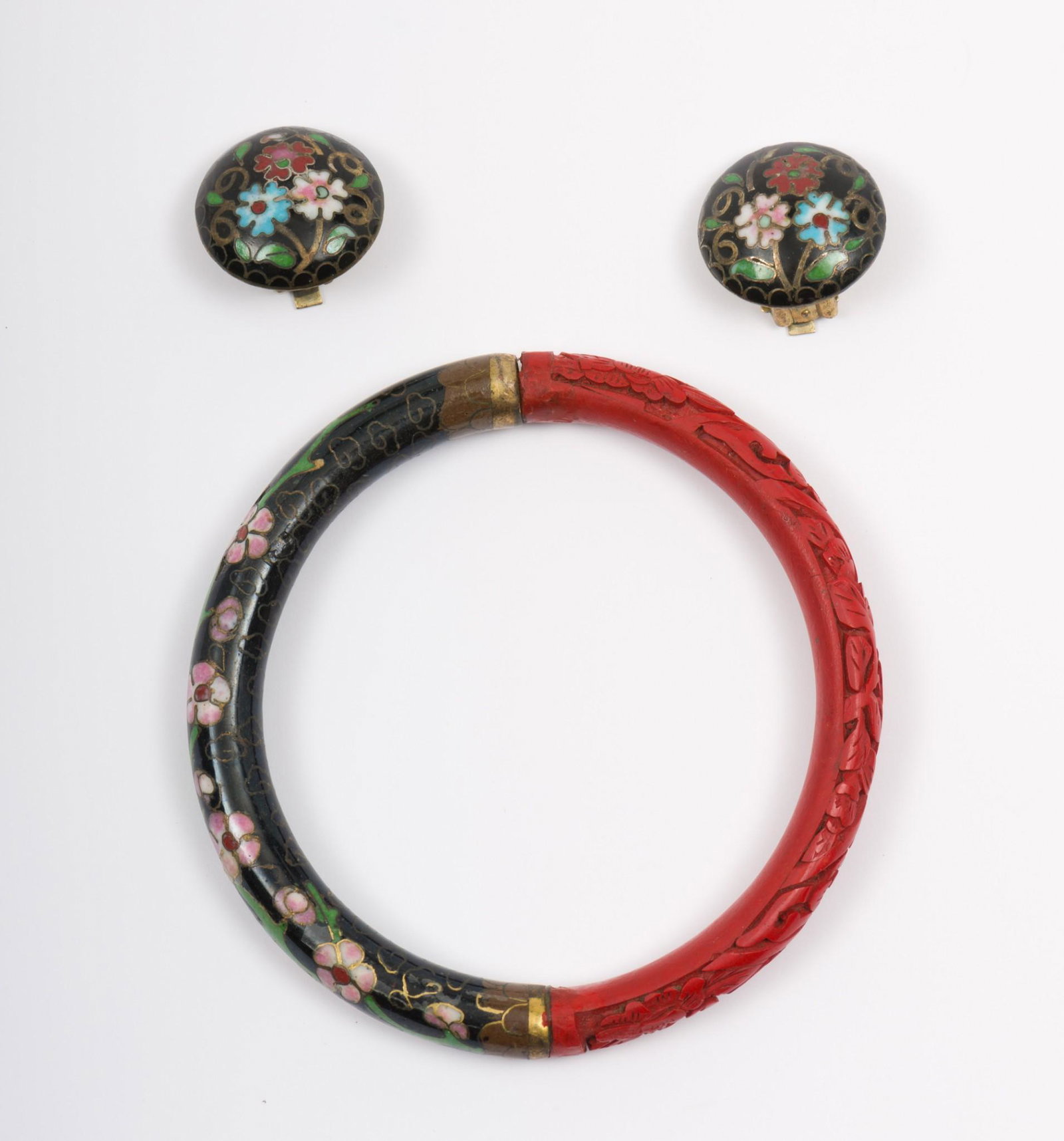Cloisonne Bangle And Earrings: Clip earrings 3/4" diameter. Bangle with cinnabar 2-1/3" interior diameter. AJ/MH IMPORTANT: Before bidding, please read the terms and conditions. When you registered for the auction you agreed t