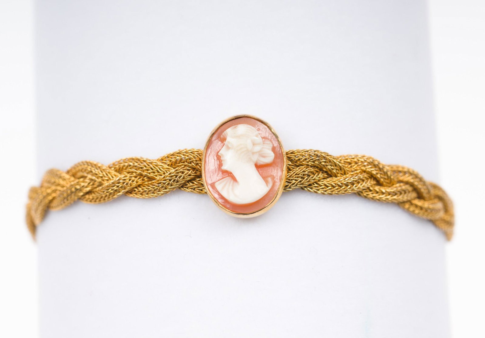 Gold Filled Cameo Bracelet: Braided chain. Cameo 1/2" wide. Bracelet 1/4" wide. 2-3/4" interior diameter. DP. IMPORTANT: Before bidding, please read the terms and conditions. When you registered for the auction you agreed to the