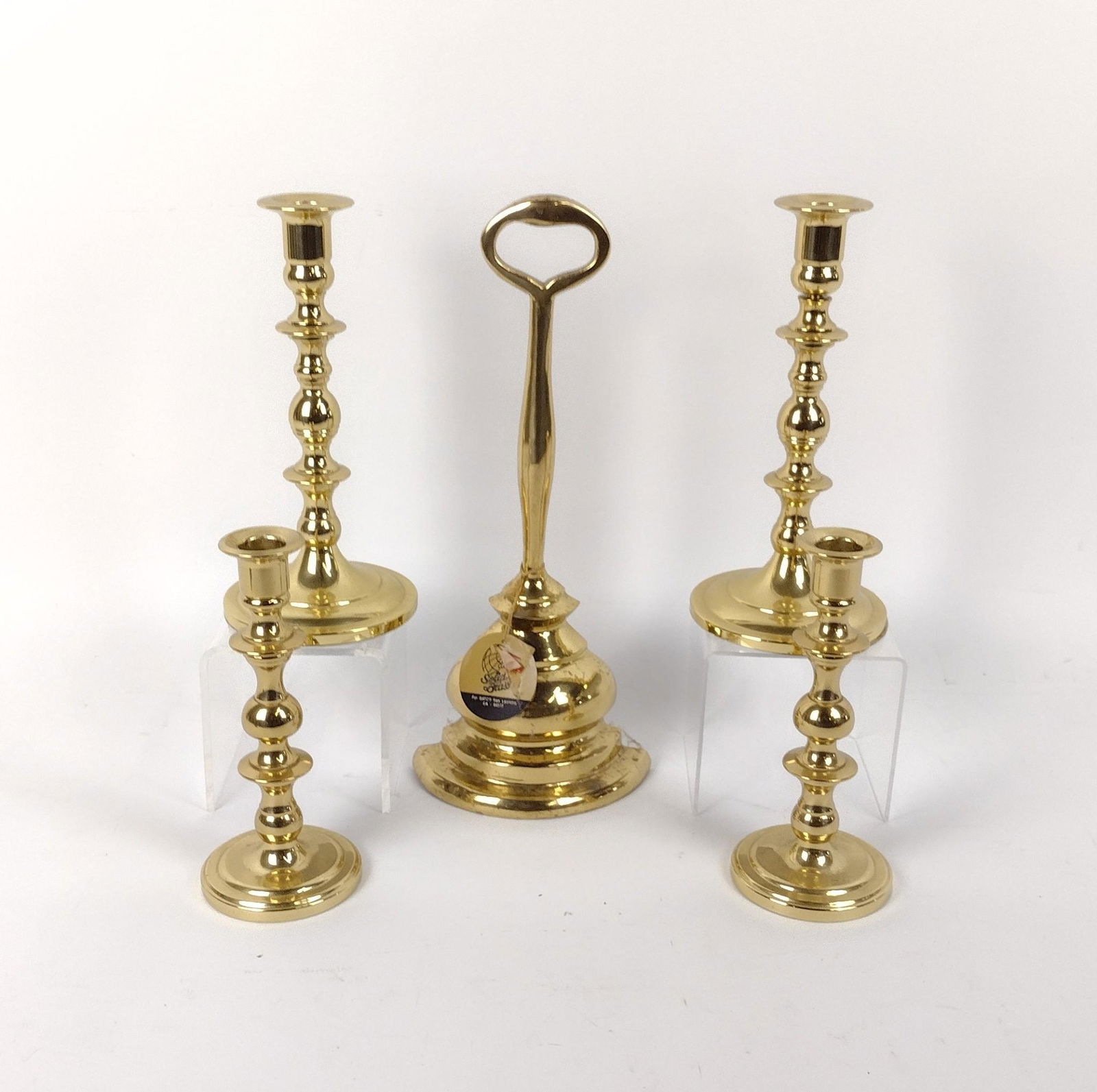 4 Candlesticks & Door Stop incl Baldwin: 3-1/4" to 5" wide X 7-1/2" to 13" high. MEG IMPORTANT: Before bidding, please read the terms and conditions. When you registered for the auction you agreed to these terms and will be required to compl