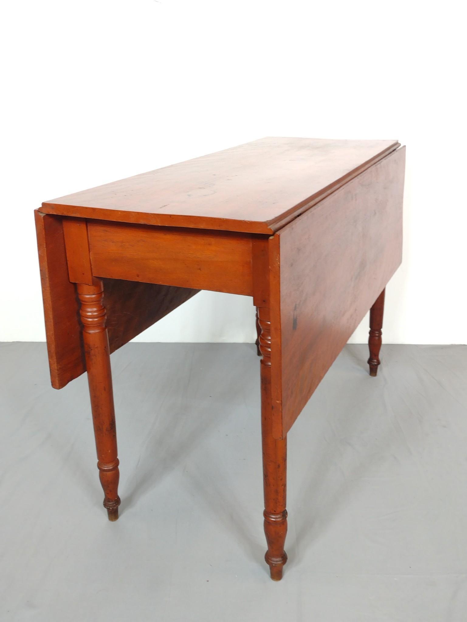 Drop Leaf Table: Open 44", closed 17-3/4" wide X 42" deep X 28-1/2" high. Table top has some areas of discoloring. MG. IMPORTANT: Before bidding, please read the terms and conditions. When you registered for the aucti
