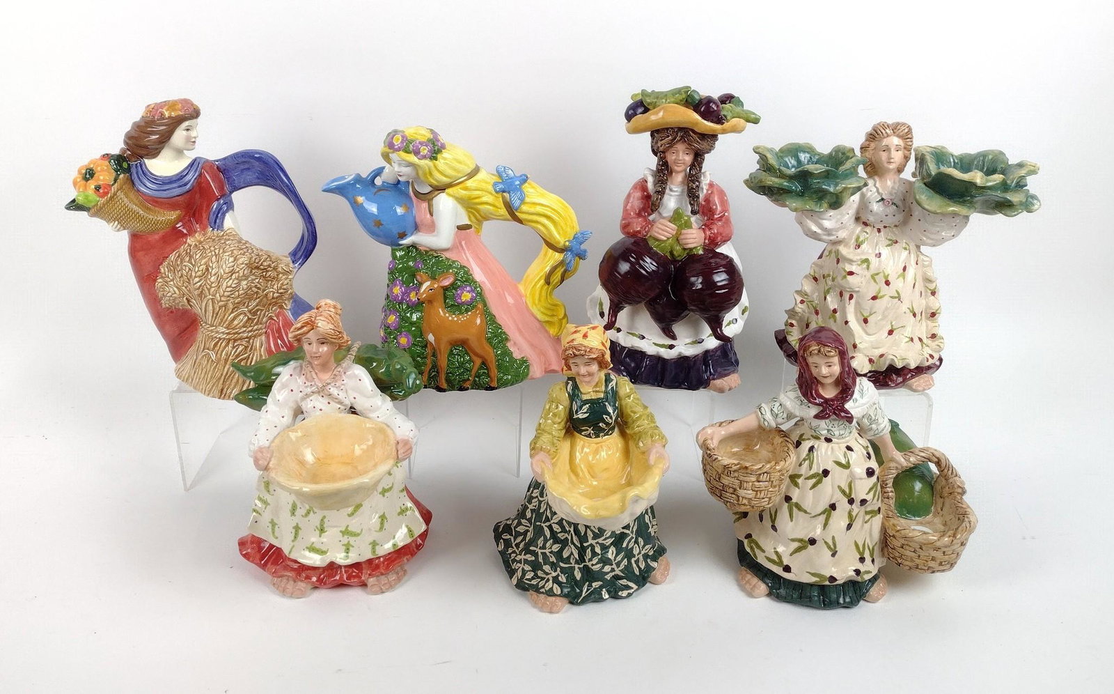 5 Blue Sky Tea Light Holders & 2 Clay Art Co Teapots: 5-1/2" to 6-1/4" wide X 8-1/2" to 9-3/4" high. MEG IMPORTANT: Before bidding, please read the terms and conditions. When you registered for the auction you agreed to these terms and will be required t