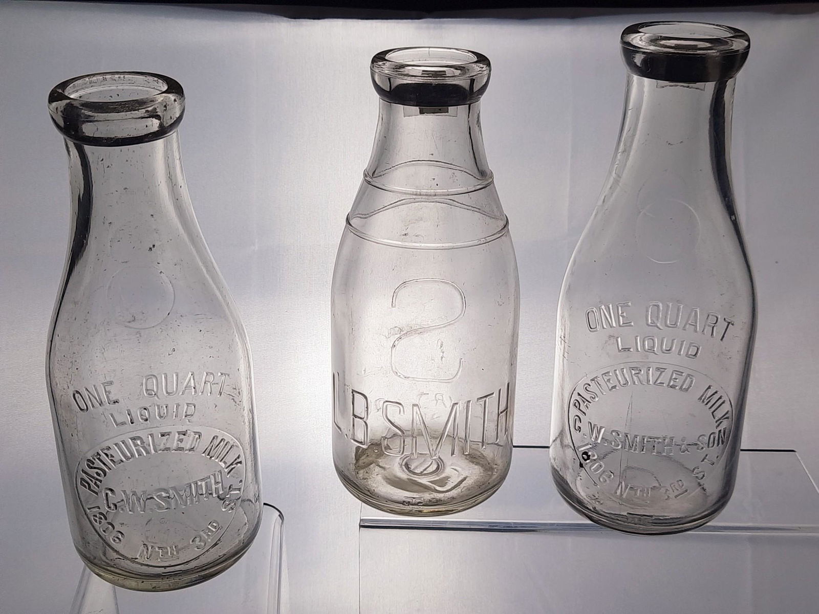 2 C. W. Smith and 1 L. B. Smith Milk Bottles (1 of 4)