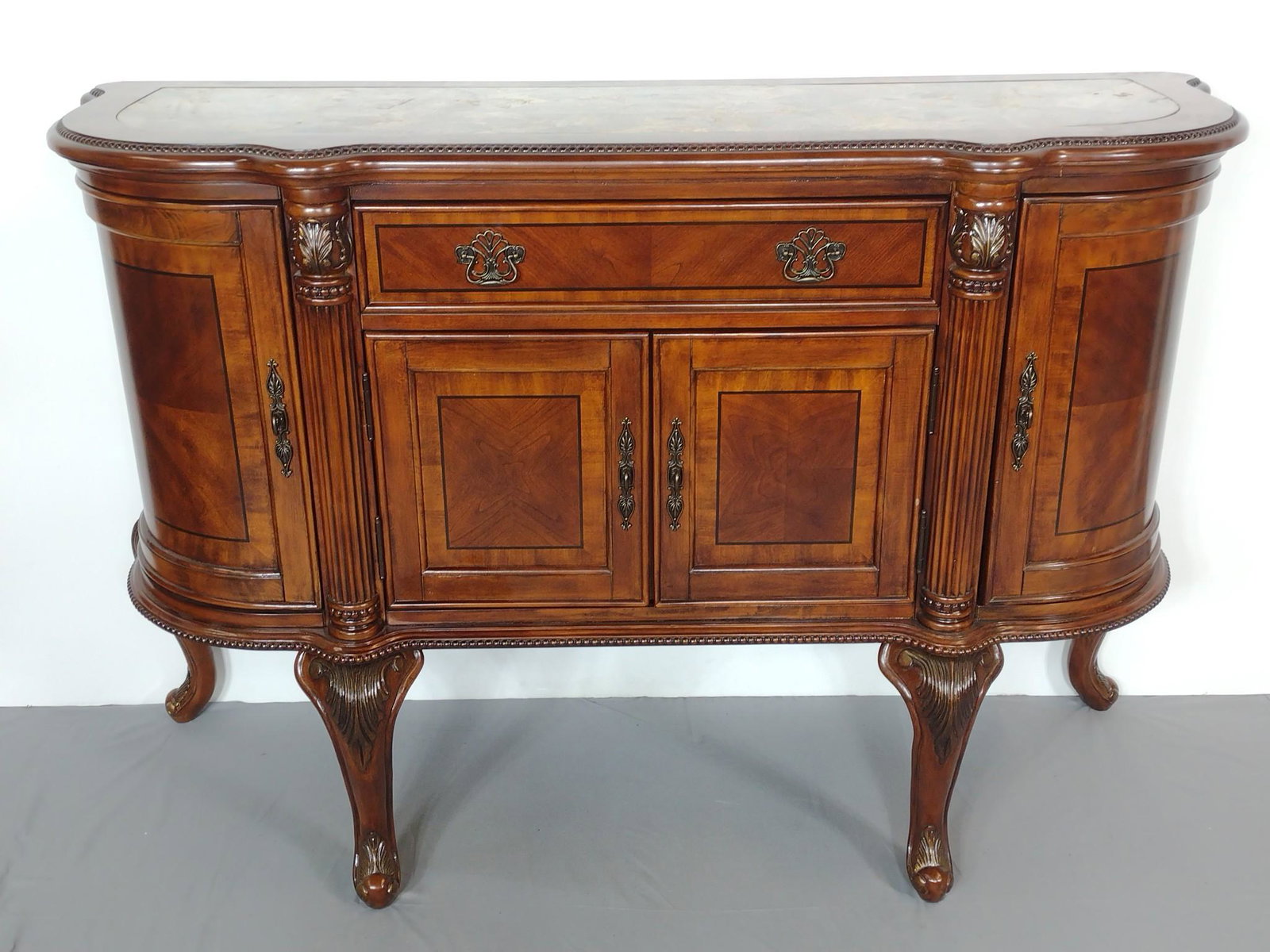 Monroe Mount Vernon Buffet: American design furniture by Monroe. 64" wide X 22" deep X 42" high. Has a few light scratches. MG. IMPORTANT: Before bidding, please read the terms and conditions. When you registered for the auction