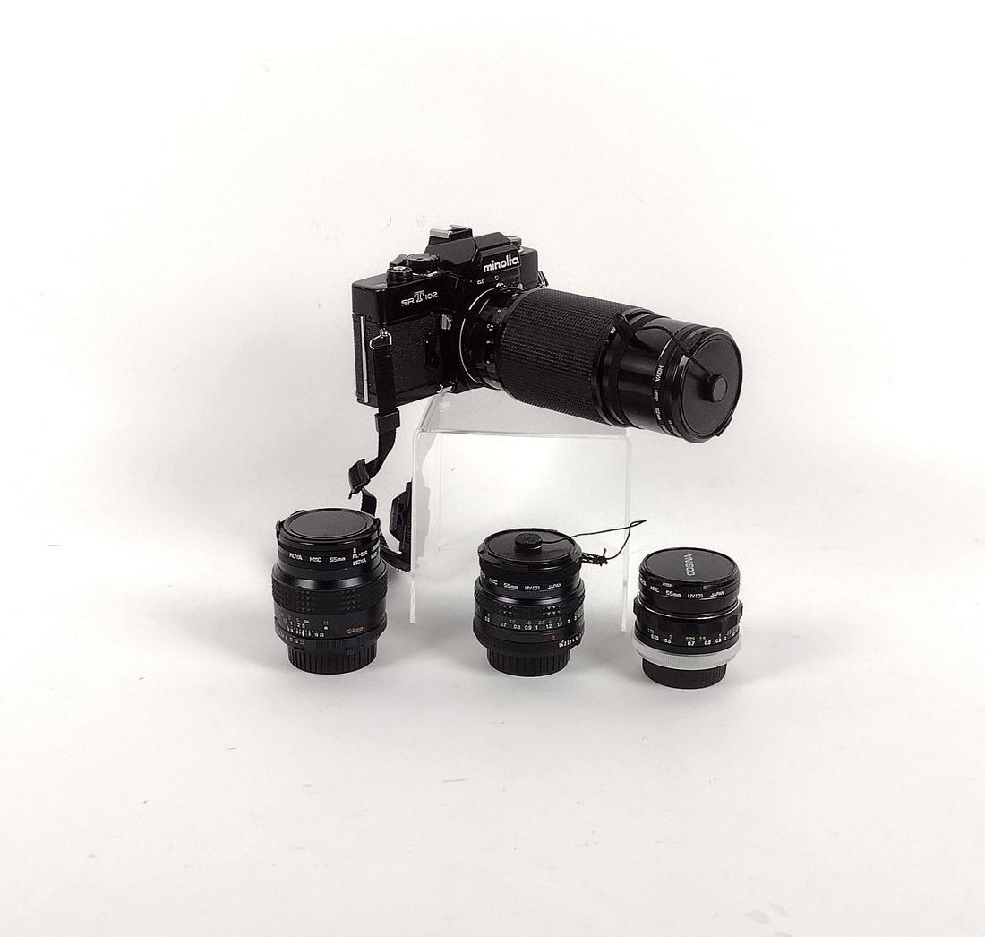 Minolta SRT 102 w/ 4 Hoya Lenses: Lenses: (3) 55mm and 62mm. MEG IMPORTANT: Before bidding, please read the terms and conditions. When you registered for the auction you agreed to these terms and will be required to comply with them.