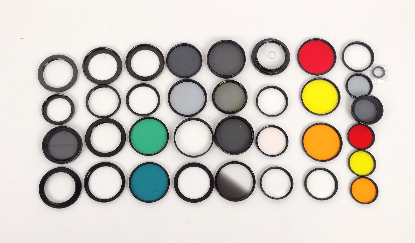 25 Camera Len Filters incl Nikon: Also includes: Hoya, Stiffen, Canon, and more. Includes 62mm, 67mm, 72mm, and 77mm. MEG IMPORTANT: Before bidding, please read the terms and conditions. When you registered for the auction you agreed