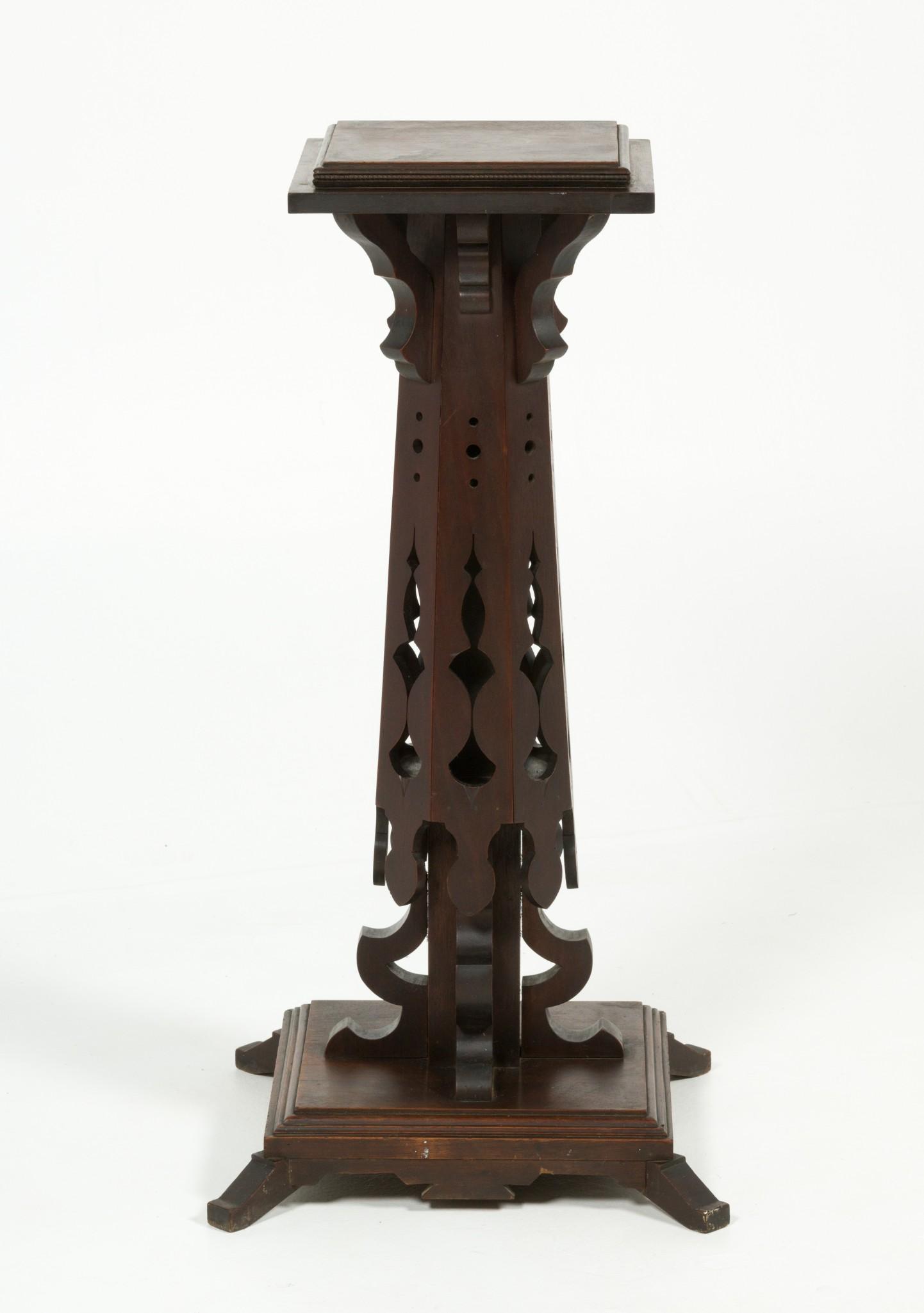 19th C. Arts & Crafts Pedestal: DESCRIPTION: An unusual oak Arts and Crafts pedestal in the manner of Augustus Pugin American or English in origin, circa 1890. The form consists of a central column with various applied carved elemen