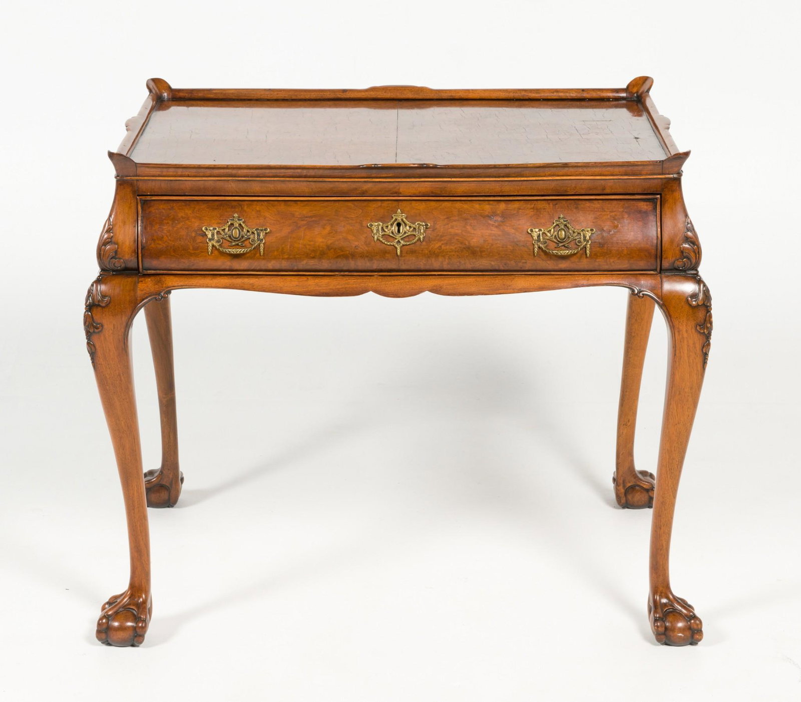Georgian Revival Burl Tea Table: DESCRIPTION: Georgian Revival rectangular cabriole leg tea table with burl wood top, circa 1950-1980. Probably European. The form consisting of four ball and claw foot cabriole legs joining a shaped a