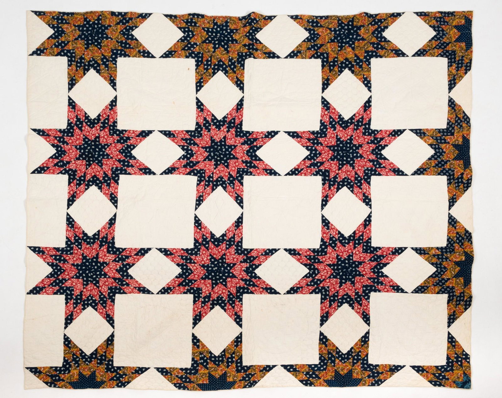 Star of Bethlehem Carroll County, Maryland Quilt: DESCRIPTION: Star of Bethlehem pattern mixed fabric quilt. Circa 1870. White ground with red and gold stars. Documented in the Quilt Documentation Project of the Historical Society of Carroll County, 