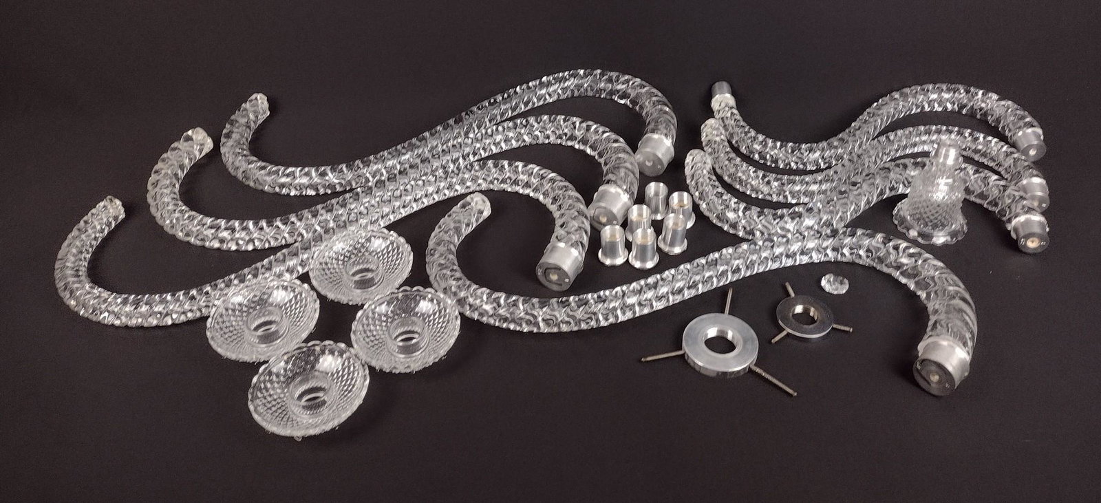 7 Baccarat Chandelier Parts: 1" to 19-1/2" wide X 1/4" to 1-1/4 high. Some losses to glass arms. MEG IMPORTANT: Before bidding, please read the terms and conditions. When you registered for the auction you agreed to these terms a