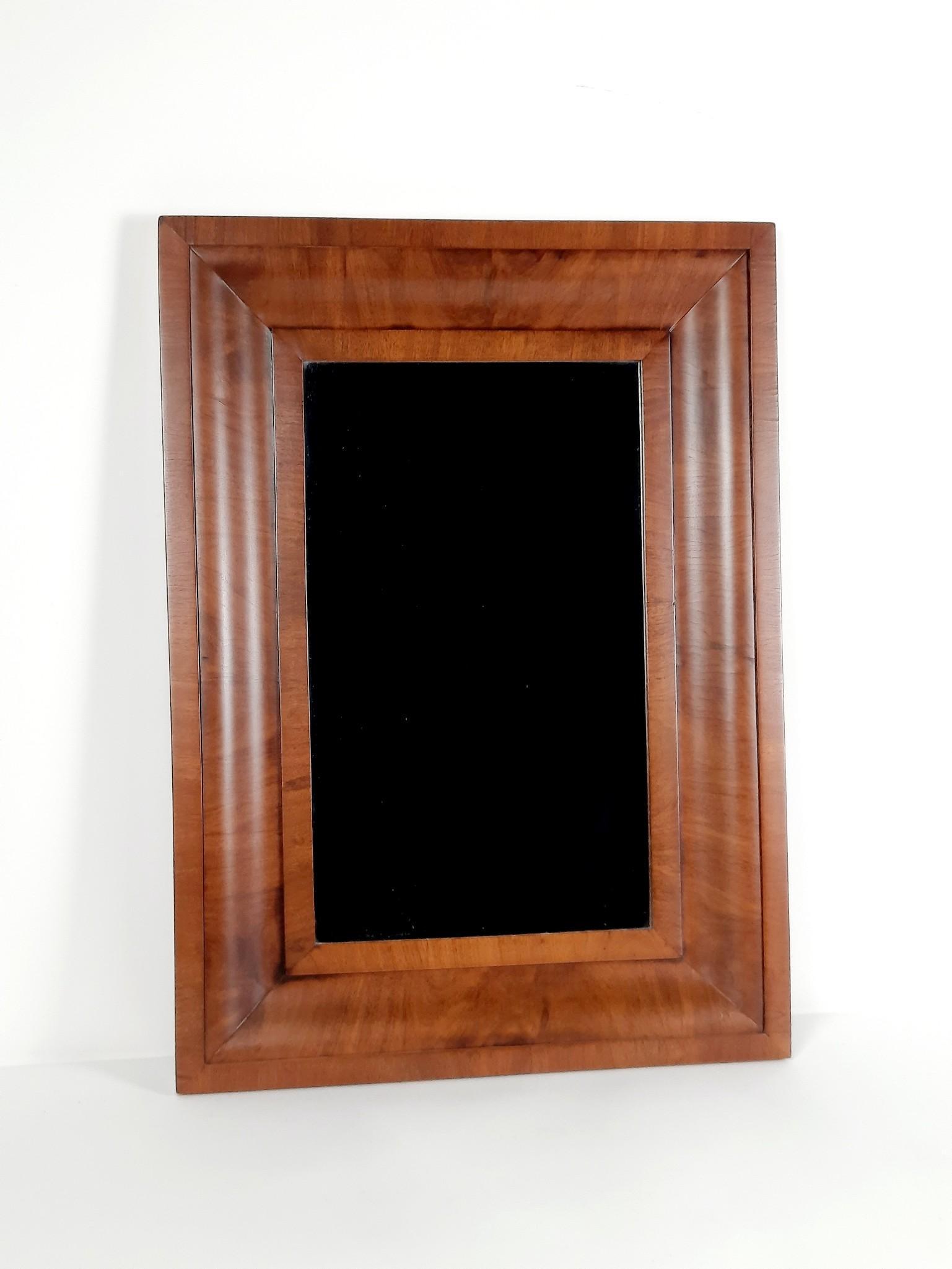 Antique Mirror: No makers markings. Overall with frame 28-1/2" high x 20-1/2" wide. LR IMPORTANT: Before bidding, please read the terms and conditions. When you registered for the auction you agreed to these terms an