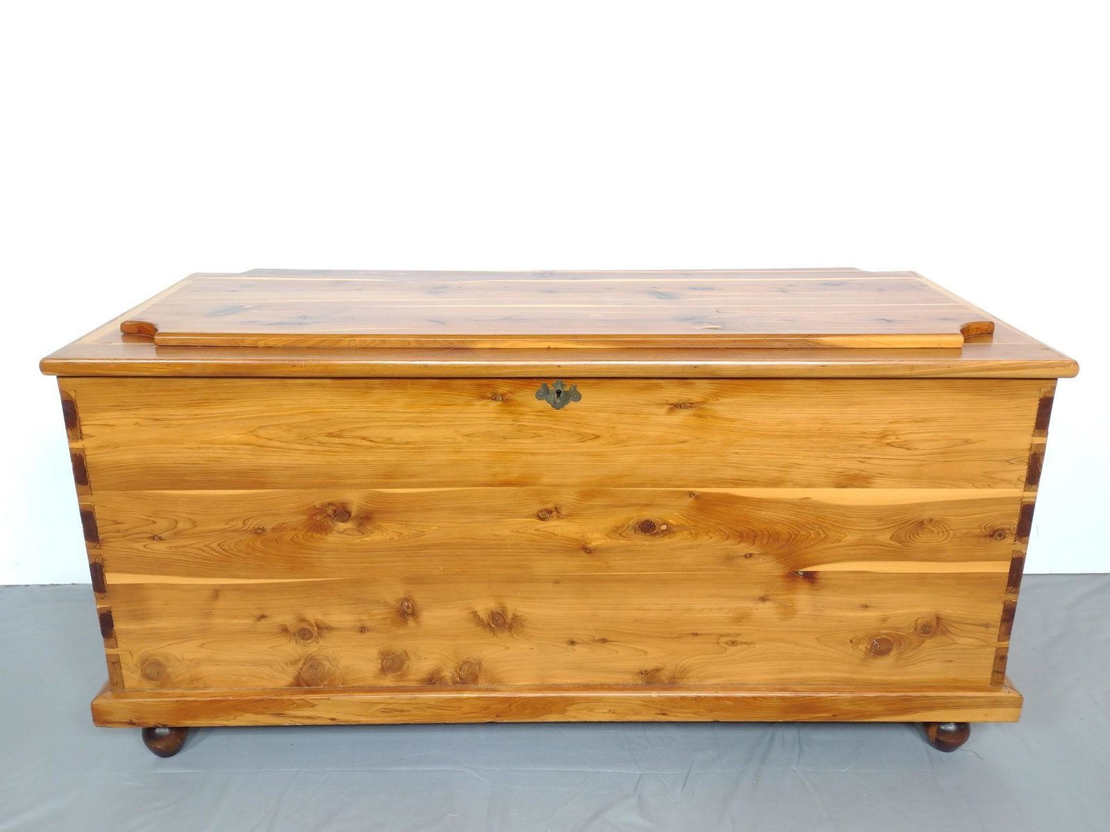 Cedar Chest: 47-1/2" wide X 20-1/2" deep X 23-1/2" high. Has a few light scratches. MG. IMPORTANT: Before bidding, please read the terms and conditions. When you registered for the auction you agreed to these term