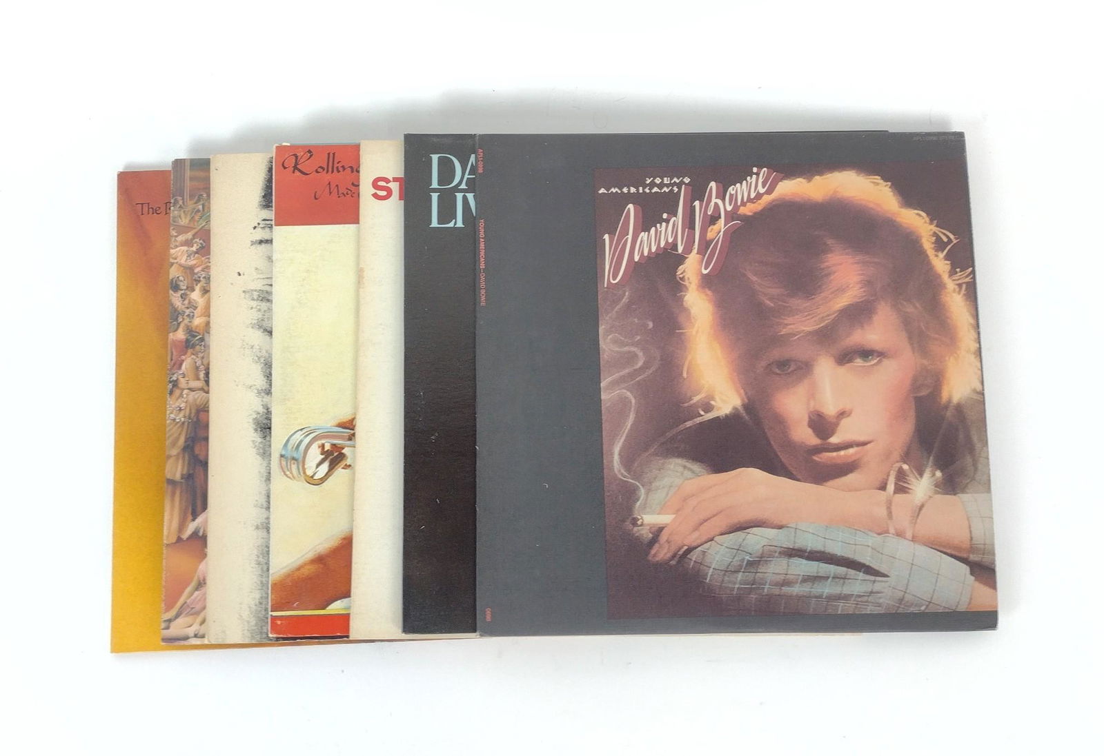 7 Albums incl David Bowie: Also includes The Rolling Stones. MEG IMPORTANT: Before bidding, please read the terms and conditions. When you registered for the auction you agreed to these terms and will be required to comply with