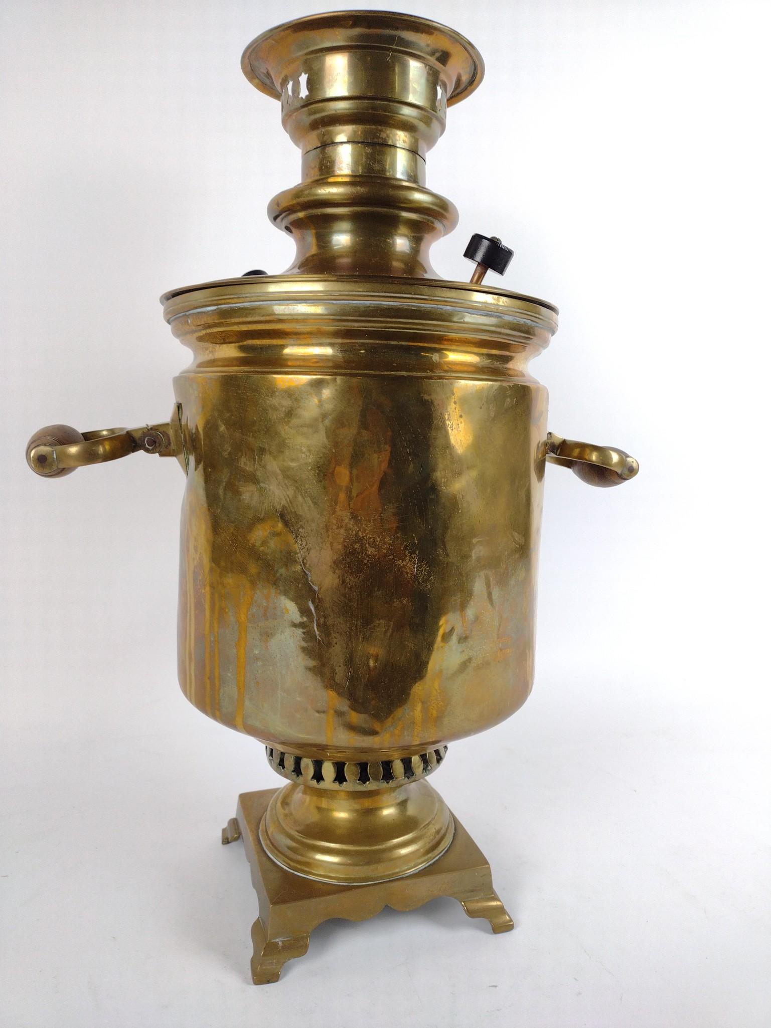 Russian Samovar: 15" wide x 14" deep x 20" high. Some denting consistent with age. JB IMPORTANT: Before bidding, please read the terms and conditions. When you registered for the auction you agreed to these terms and 