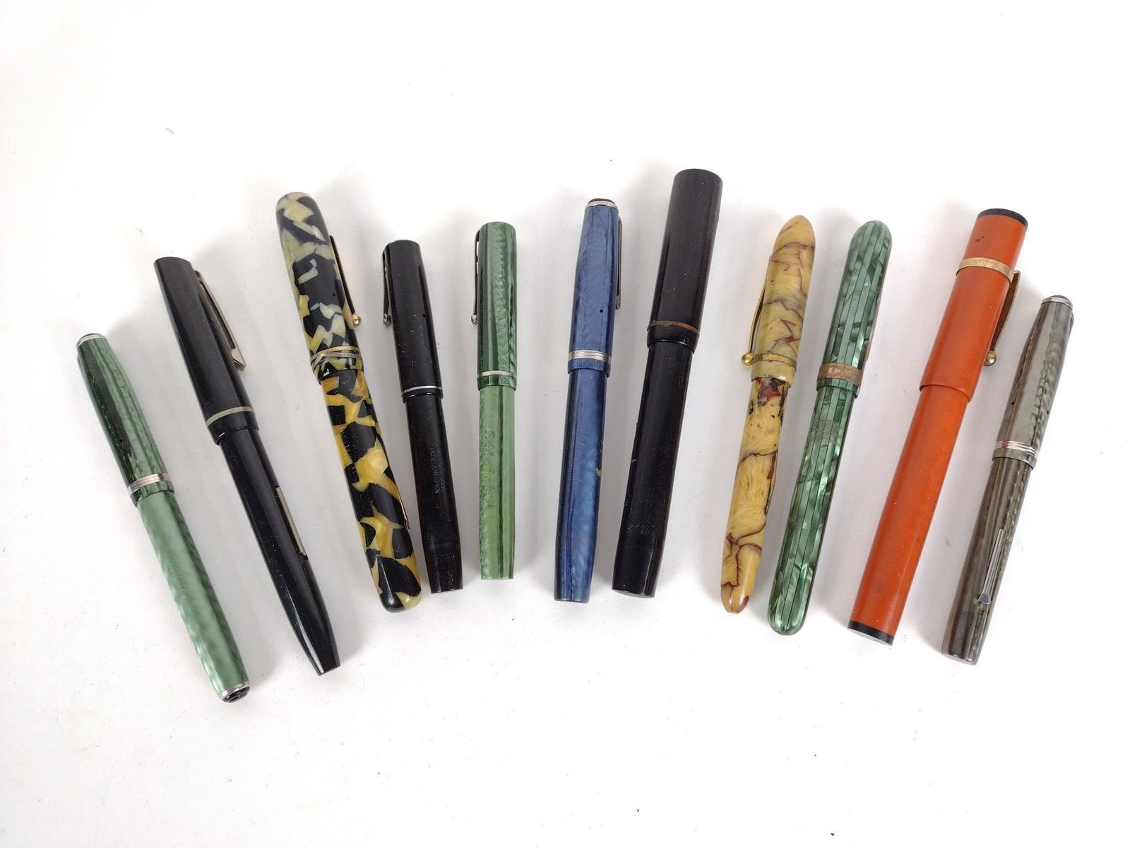 11 Fountain Pens: 4-1/ 4 " to 5-1/2" long. JB IMPORTANT: Before bidding, please read the terms and conditions. When you registered for the auction you agreed to these terms and will be required to comply with them.