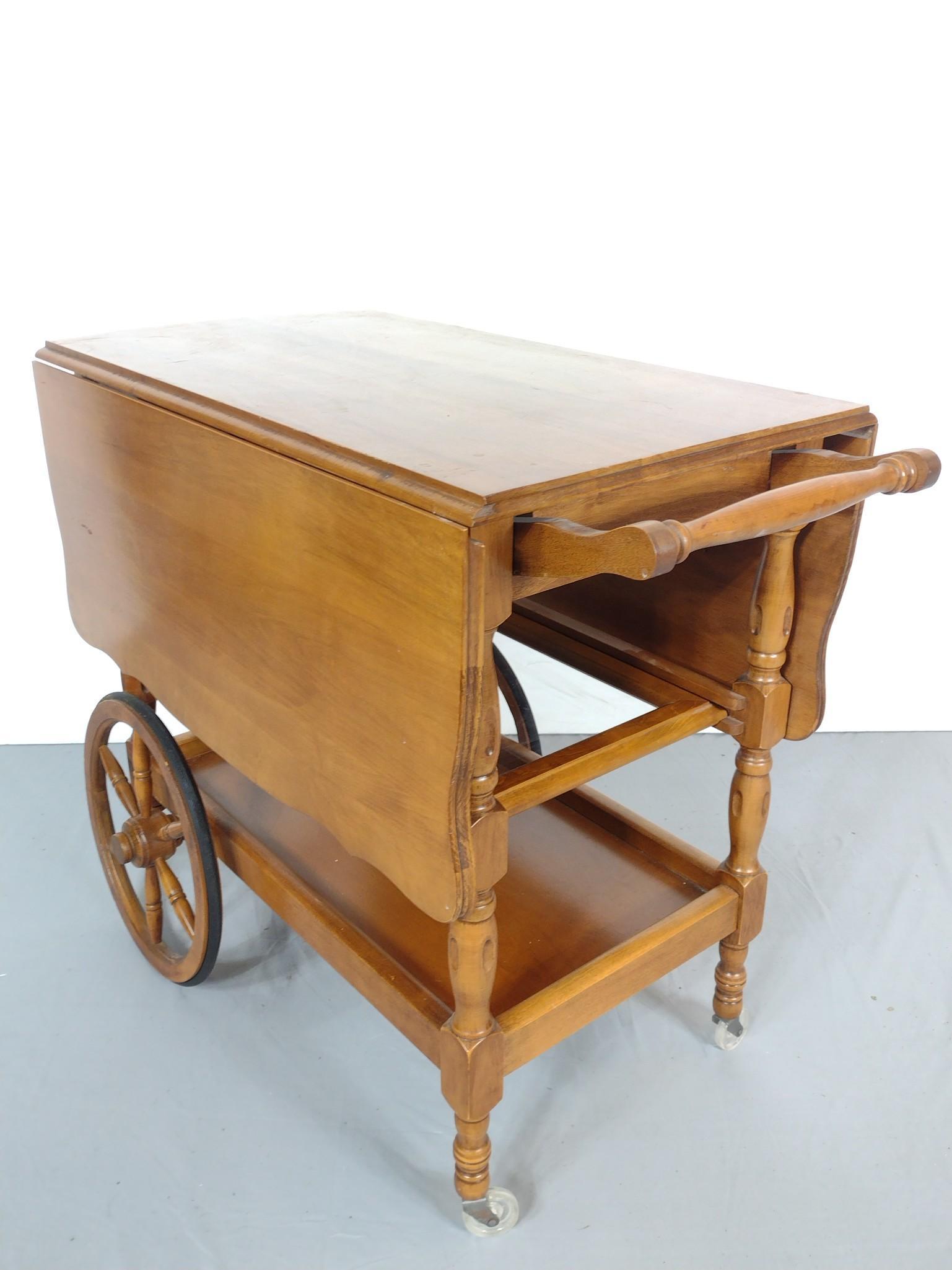 Tea Cart: Open 41", closed 18" wide X 34" deep X 28" high. No manufactures name found. MG. IMPORTANT: Before bidding, please read the terms and conditions. When you registered for the auction you agreed to thes