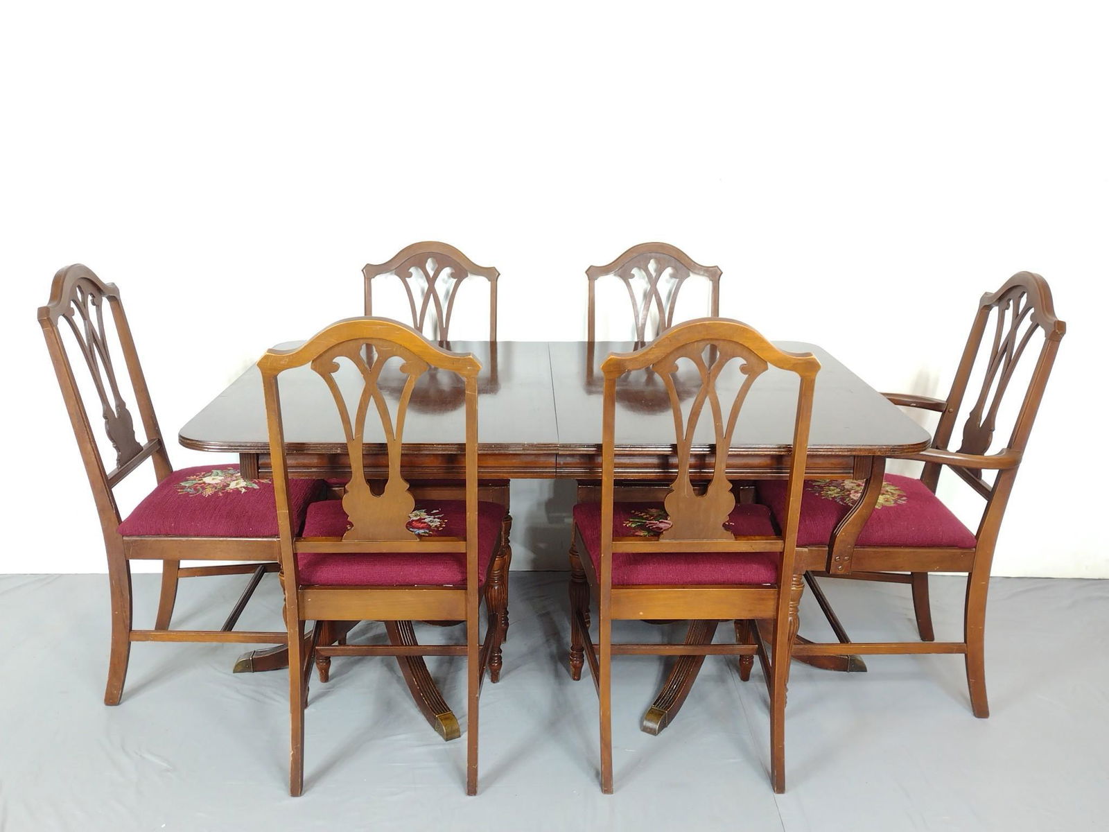 Dining Room Table & Chair Set: Table 60" wide X 40" deep X 30" high. Needle point chairs 22-1/2" wide X 18" deep X 41" high. Table top has some scratches and finish loss. Chairs also have scratches and finish loss. MG. IMPORTANT: B