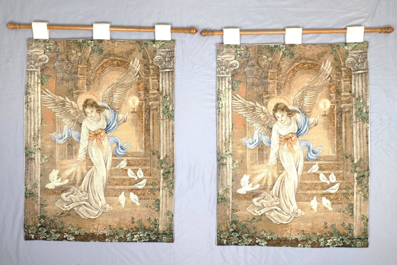 2 Angel Tapestries Signed Lena Liu: 32" wide x 38" high. JB IMPORTANT: Before bidding, please read the terms and conditions. When you registered for the auction you agreed to these terms and will be required to comply with them.