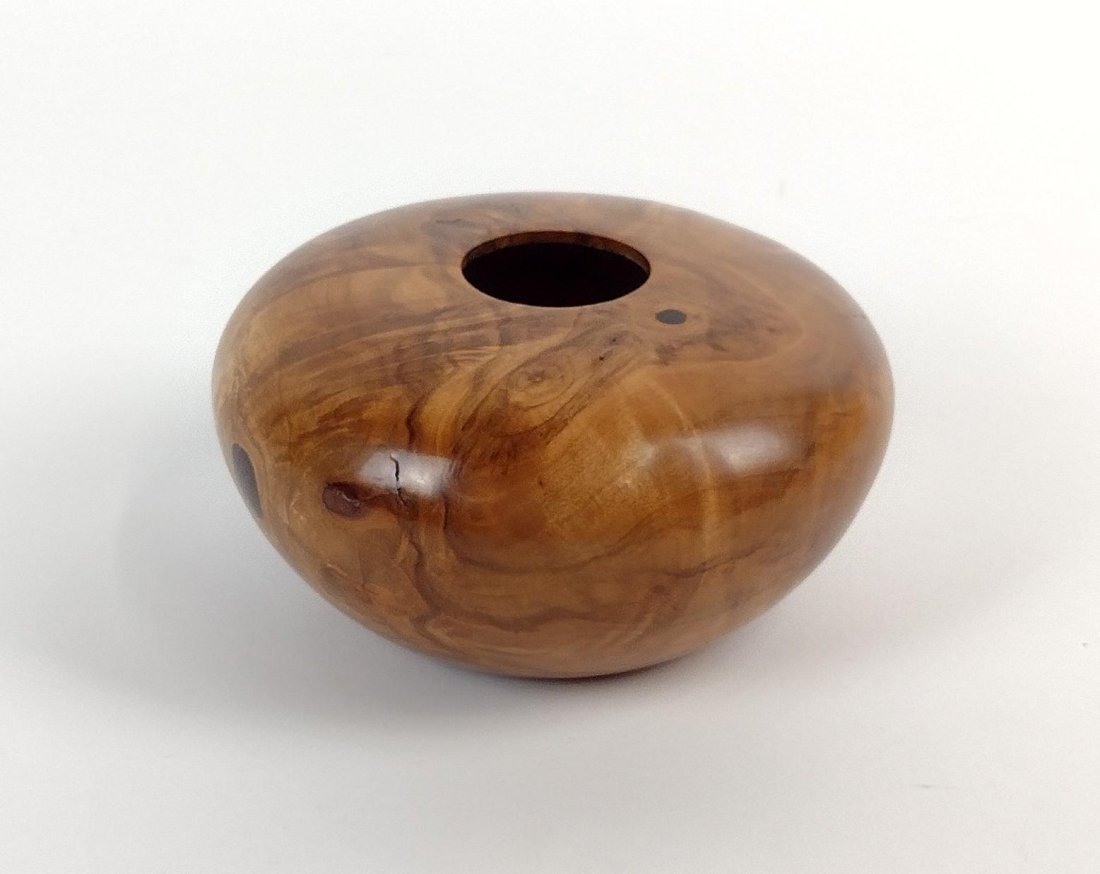 Terry Alby Wooden Bowl: Signed. 6" diameter X 2-1/2" high. MEG IMPORTANT: Before bidding, please read the terms and conditions. When you registered for the auction you agreed to these terms and will be required to comply wit