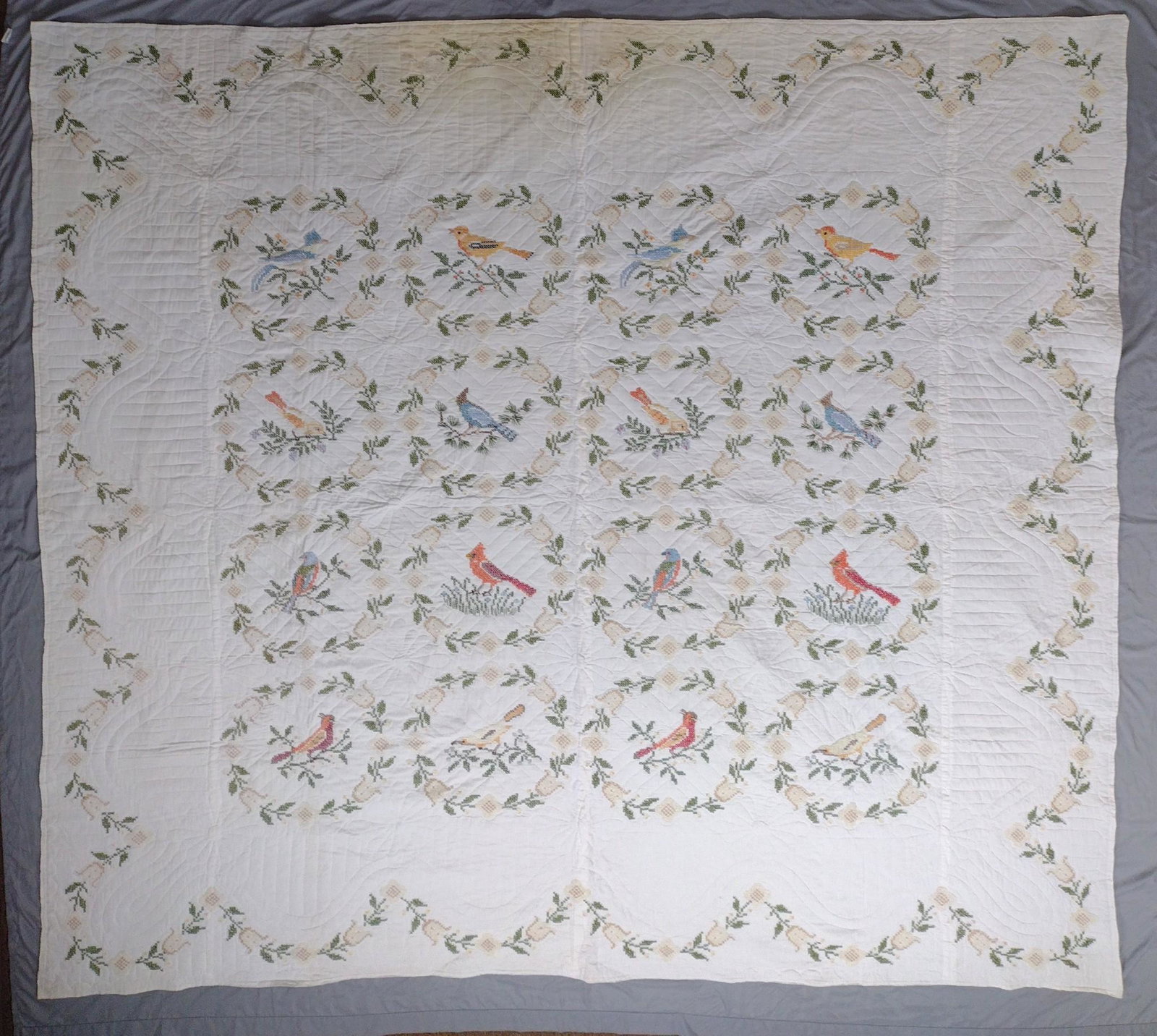Quilt: 64" to 92" wide x 92" x 96" long. Some staining. JB IMPORTANT: Before bidding, please read the terms and conditions. When you registered for the auction you agreed to these terms and will be required 