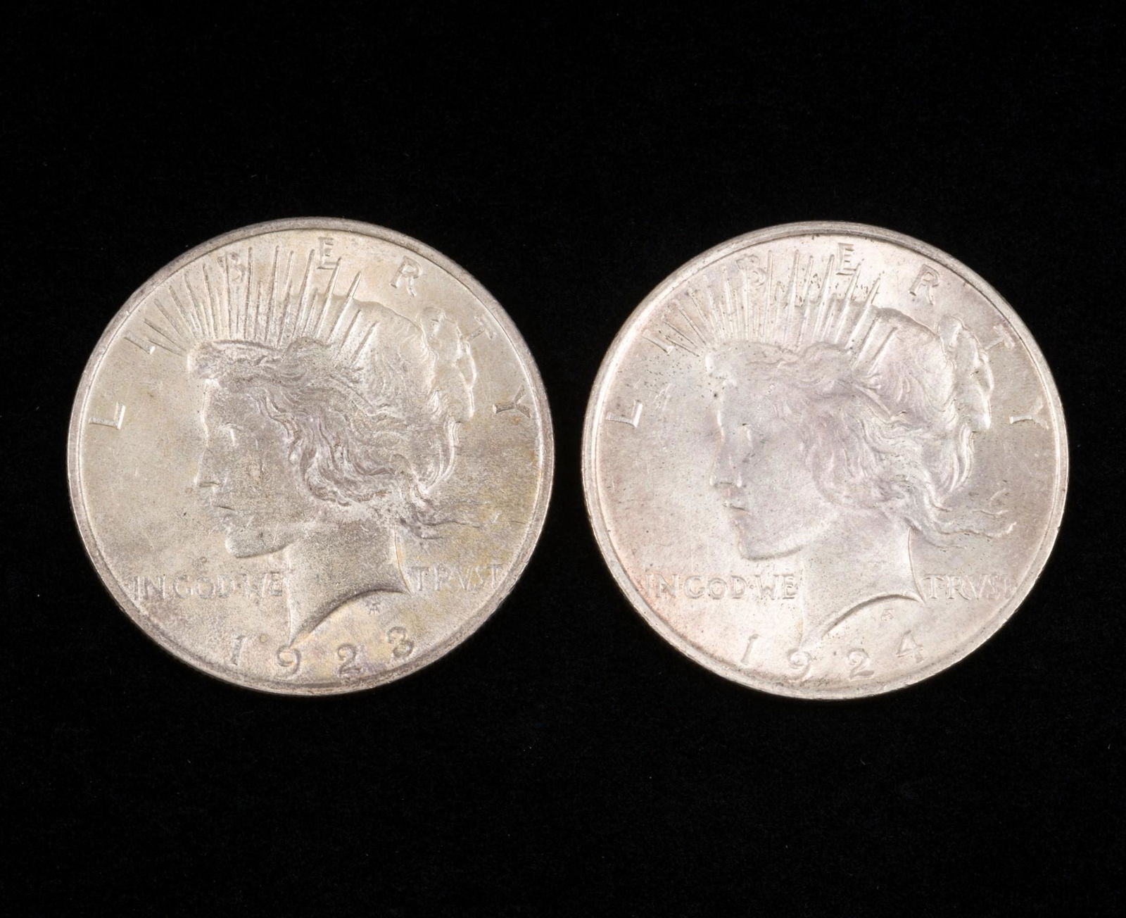 1923 and 24 Peace Silver Dollars (1 of 2)
