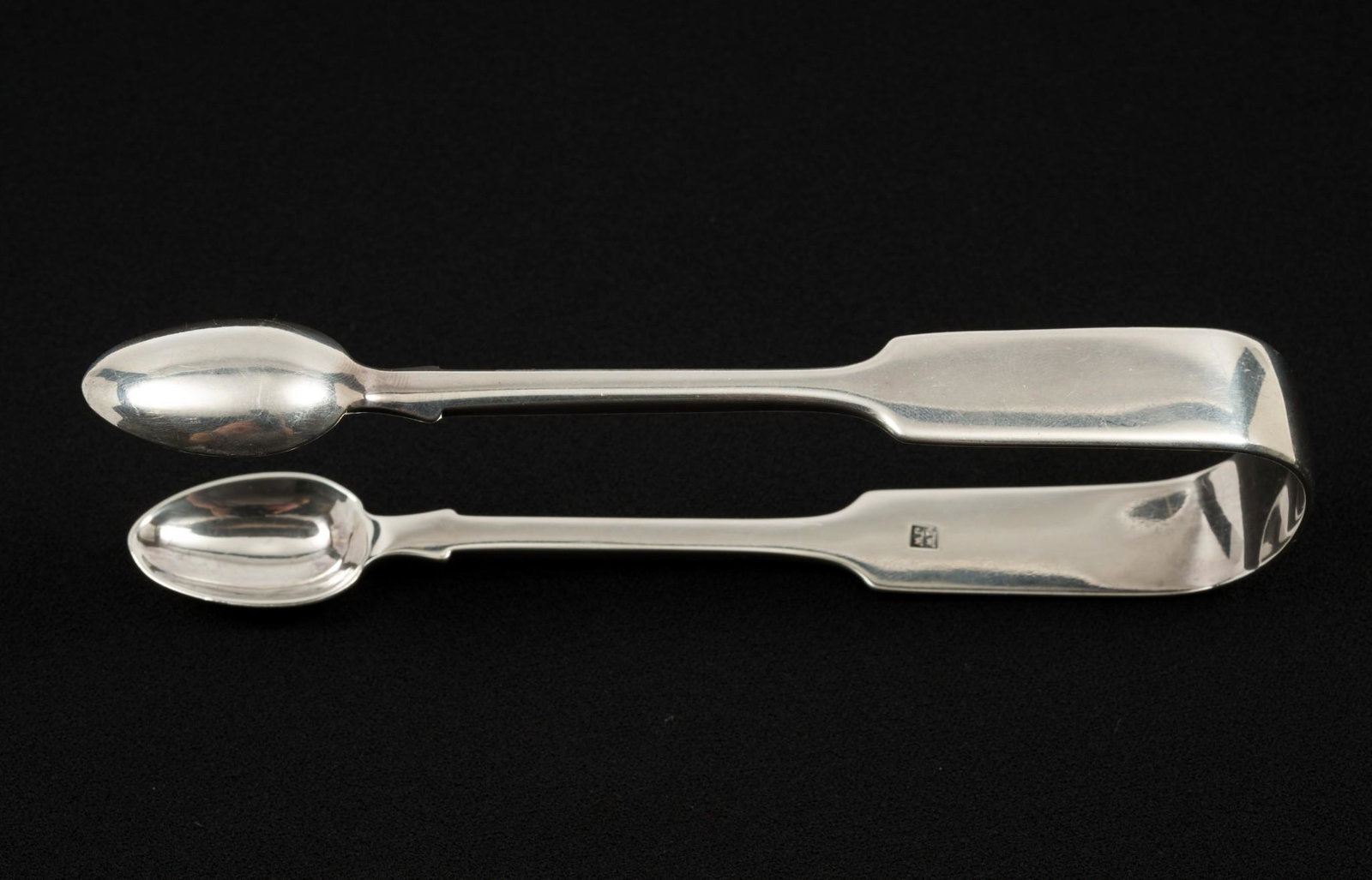1854 Josiah & James Williams Sterling Tongs: Sterling sugar tongs marked for Josiah and James Williams, Exeter, Queen Victoria, 1854. 5-1/2" long. 2.0 ozt. Light wear as expected with age. DP. IMPORTANT: Before bidding, please read the terms and