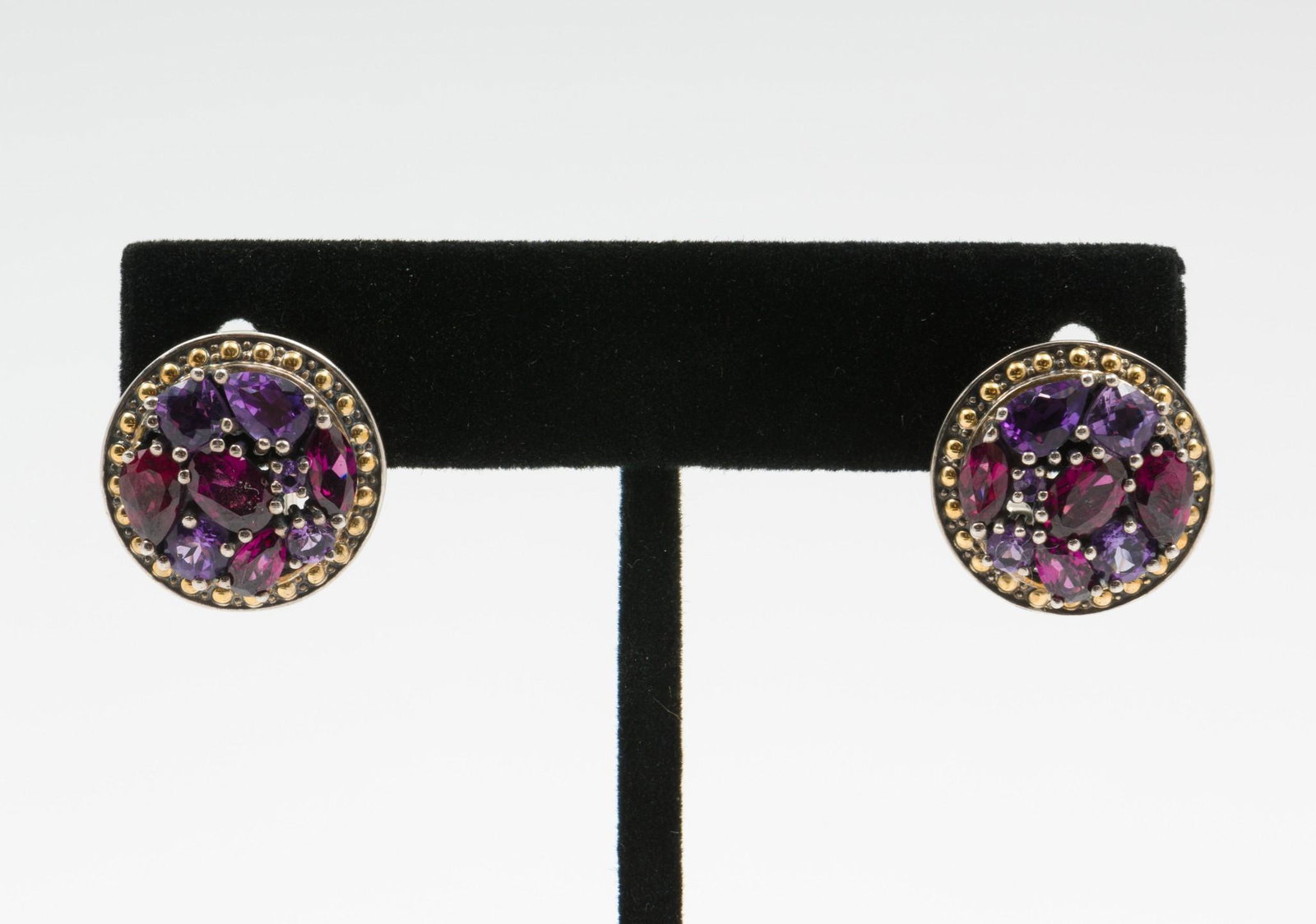 Effy Sterling, 18K Gold, Amethyst & Rhodolite Earrings: Marked 925 and 18k. Amethyst and rhodolite gemstones. Pierced omega backs. 5/8" diameter. Includes Certificate of Authenticity. AJ/EK IMPORTANT: Before bidding, please read the terms and conditions. W