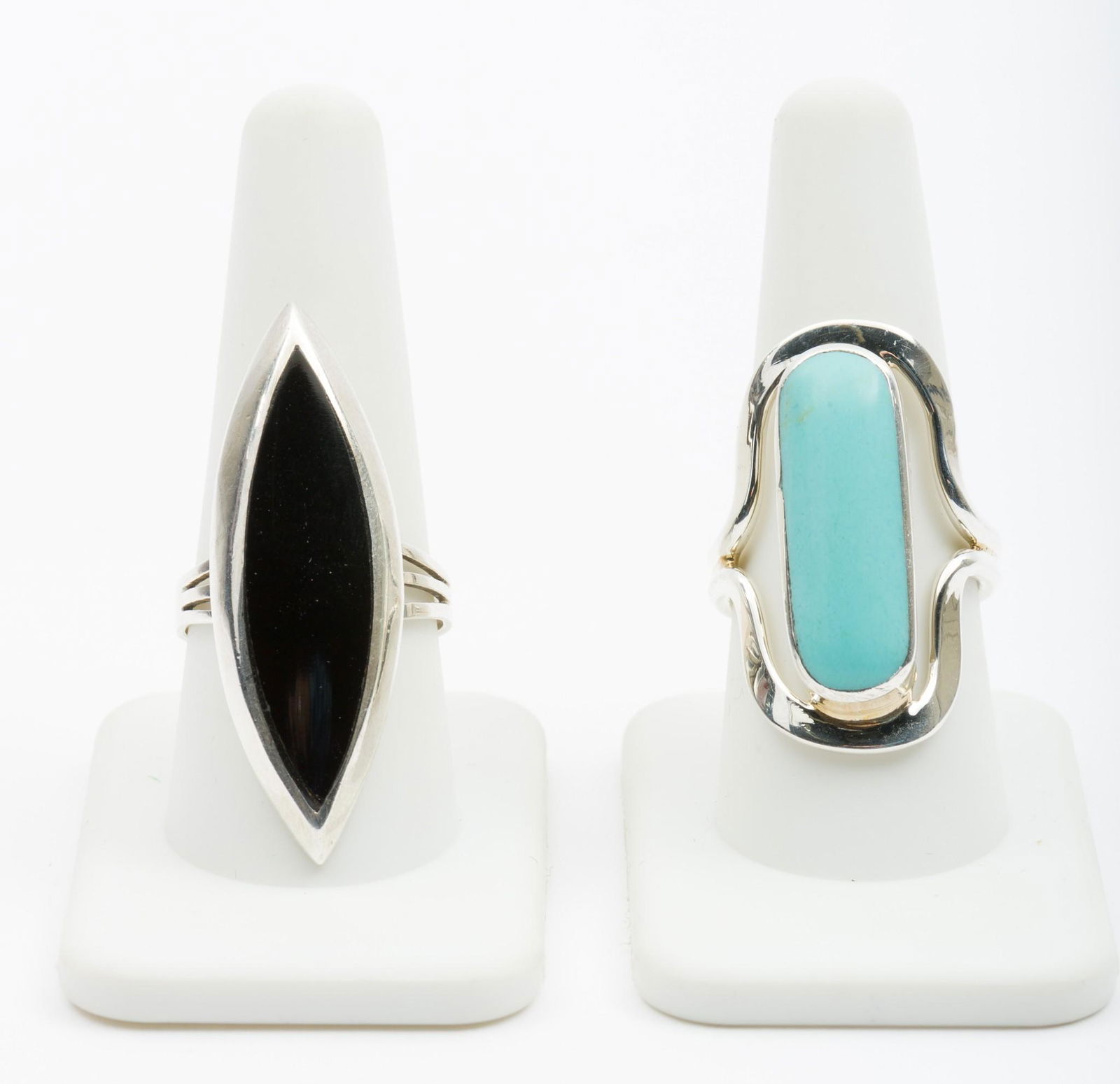 2 Sterling, Black Onyx & Turquoise Rings: Onyx 1-5/8" top. Size 9.5. Turquoise 1-3/8" top. Size 8.5. EK IMPORTANT: Before bidding, please read the terms and conditions. When you registered for the auction you agreed to these terms and will be