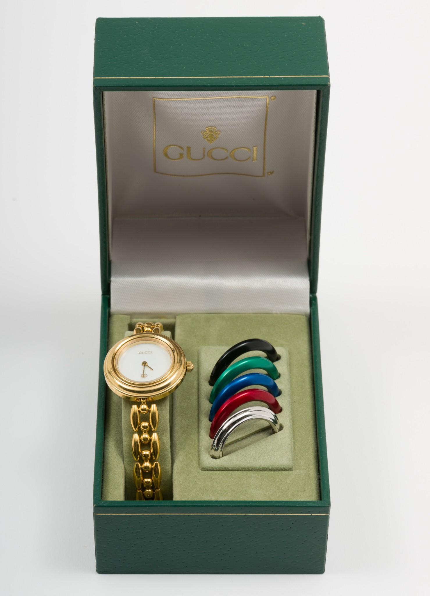 Vintage Gucci 18K Plated Interchangable Bezel Watch in OB (#0219) on Feb 26, 2023 | Cordier Auctions & Appraisals in PA Vintage Gucci 18K Plated Interchangable Bezel Watch in OB (#0219) on Feb 26, 2023 | Cordier Auctions & Appraisals in PA
