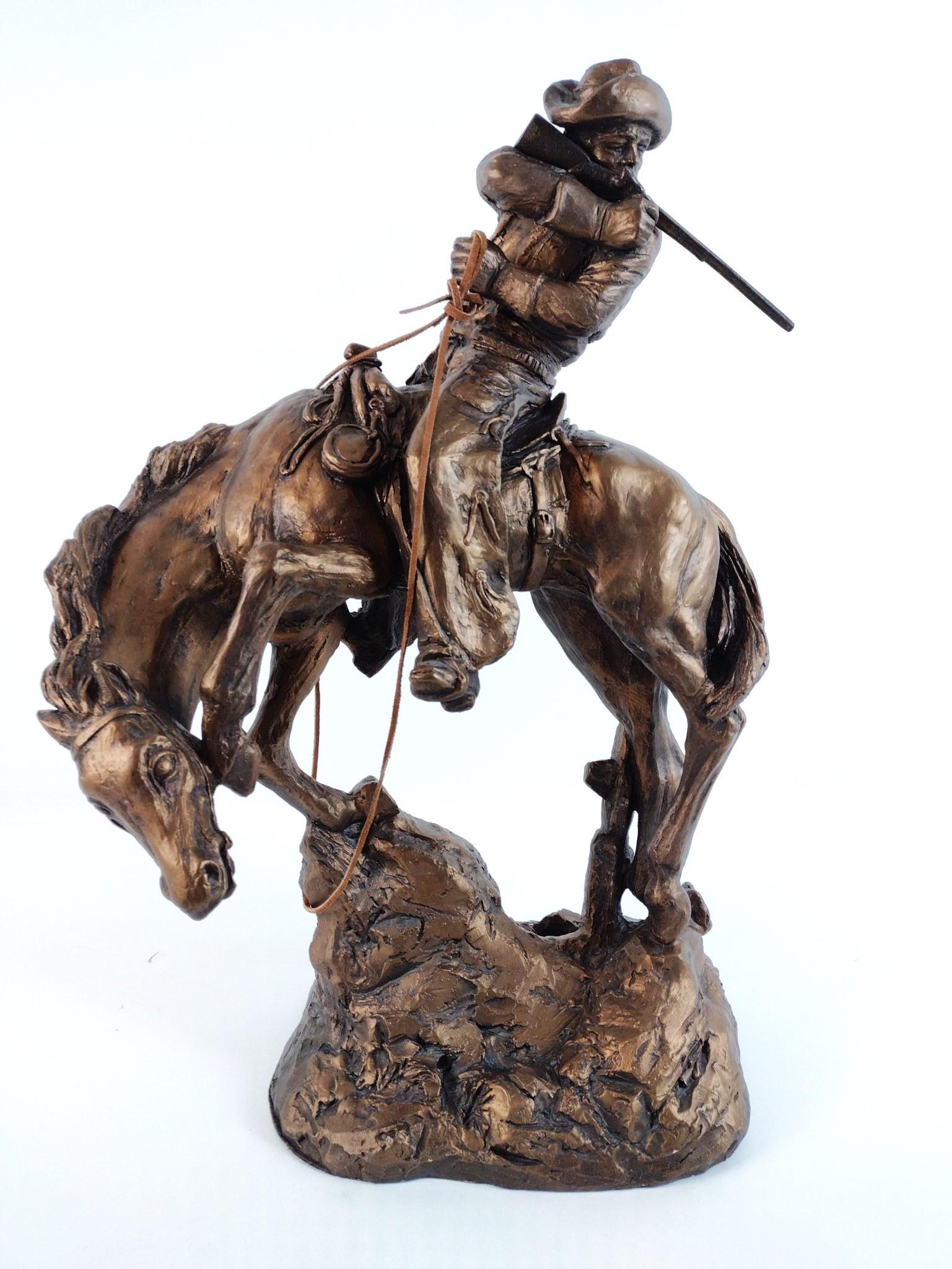 Remington Style "The Rattler" Sculpture: Made by Austin Productions. Made of durastone. 21" high x 14" wide x 10" deep. Few small chips. JB IMPORTANT: Before bidding, please read the terms and conditions. When you registered for the auction 
