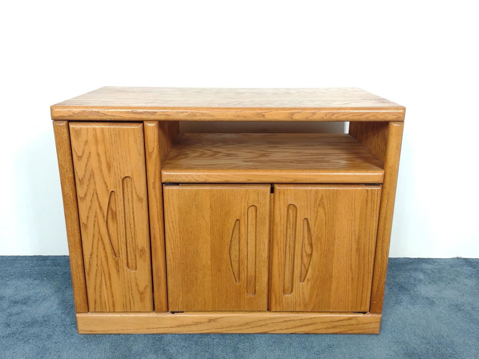 TV Stand: 36-1/2" wide X 19-1/2" deep X 27-1/2" high. No manufactures name found. MG. IMPORTANT: Before bidding, please read the terms and conditions. When you registered for the auction you agreed to these ter