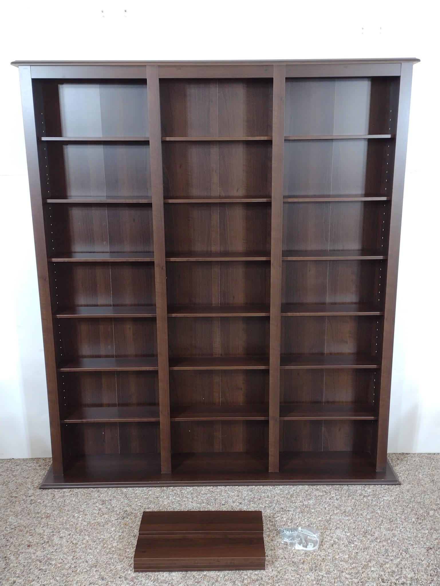 Wall CD/DVD Shelf: 57" wide X 9-1/2" deep X 63-1/2" high. Comes with extra shelves. No manufactures name found. MG. IMPORTANT: Before bidding, please read the terms and conditions. When you registered for the auction yo