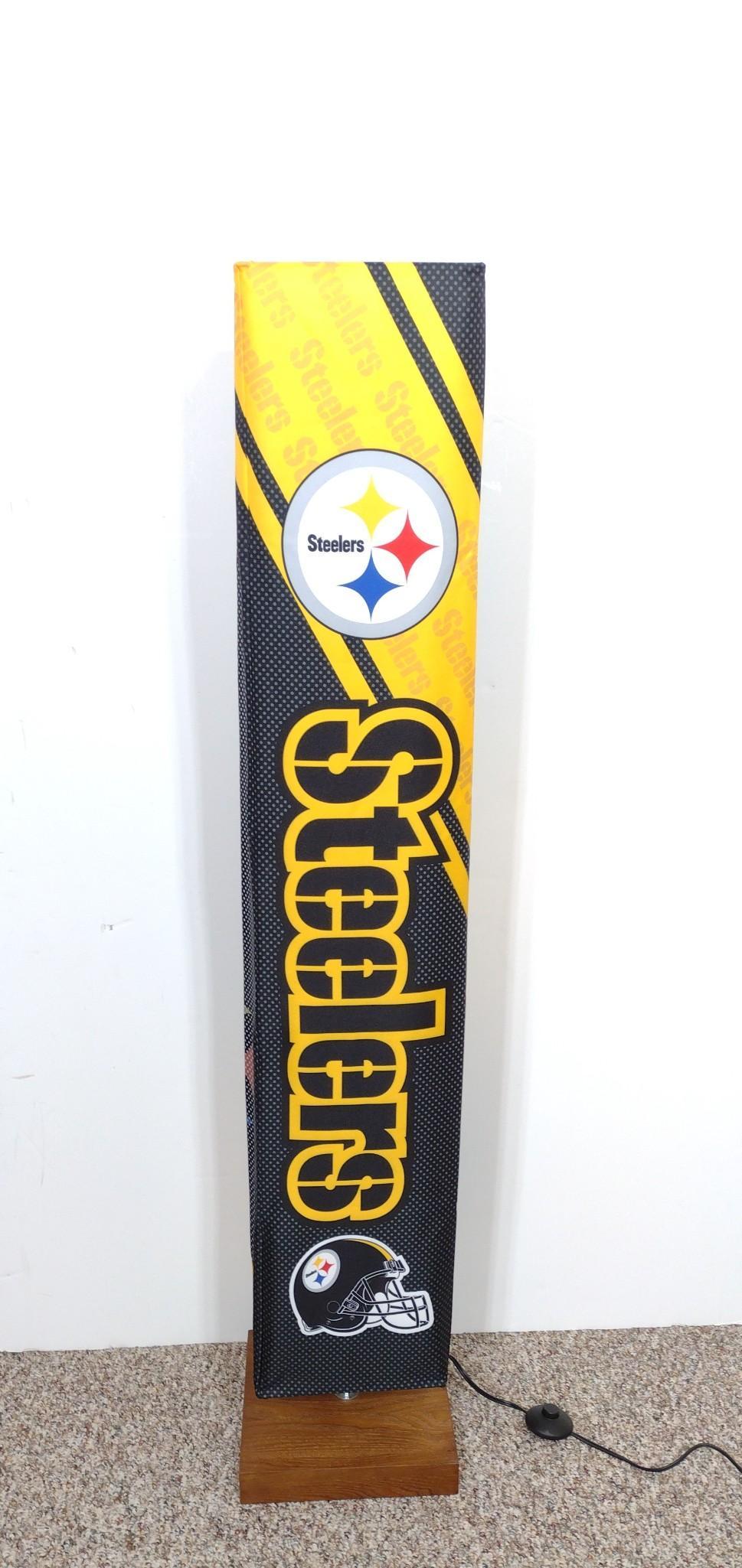 Steelers Floor Lamp: 11-1/2" wide X 11-1/2" deep X 60" high. Working. MG. IMPORTANT: Before bidding, please read the terms and conditions. When you registered for the auction you agreed to these terms and will be required