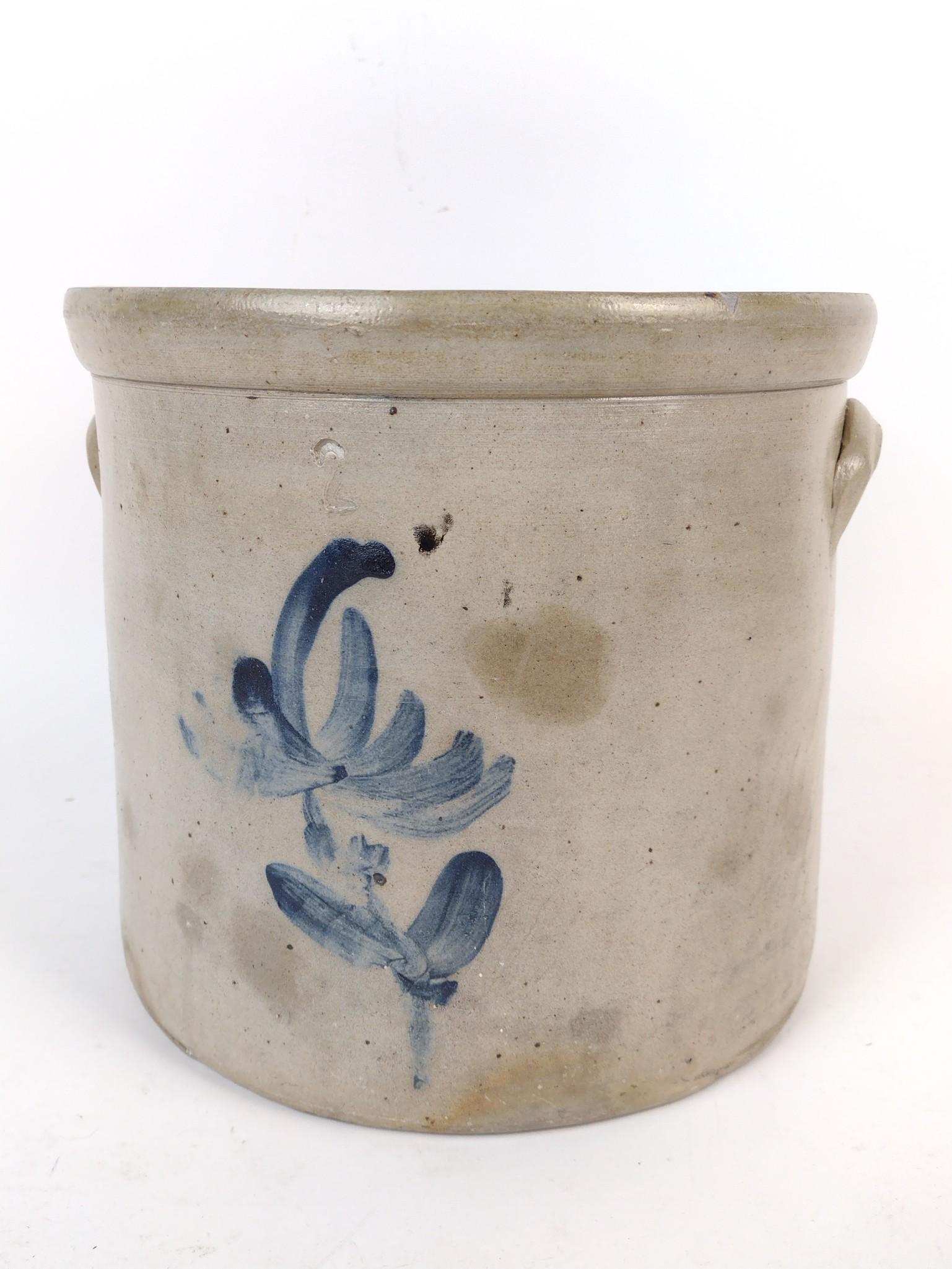 2 Gallon Stoneware Crock: 10-1/4" diameter X 9-1/2" high. Has a few small chips. MG. IMPORTANT: Before bidding, please read the terms and conditions. When you registered for the auction you agreed to these terms and will be re