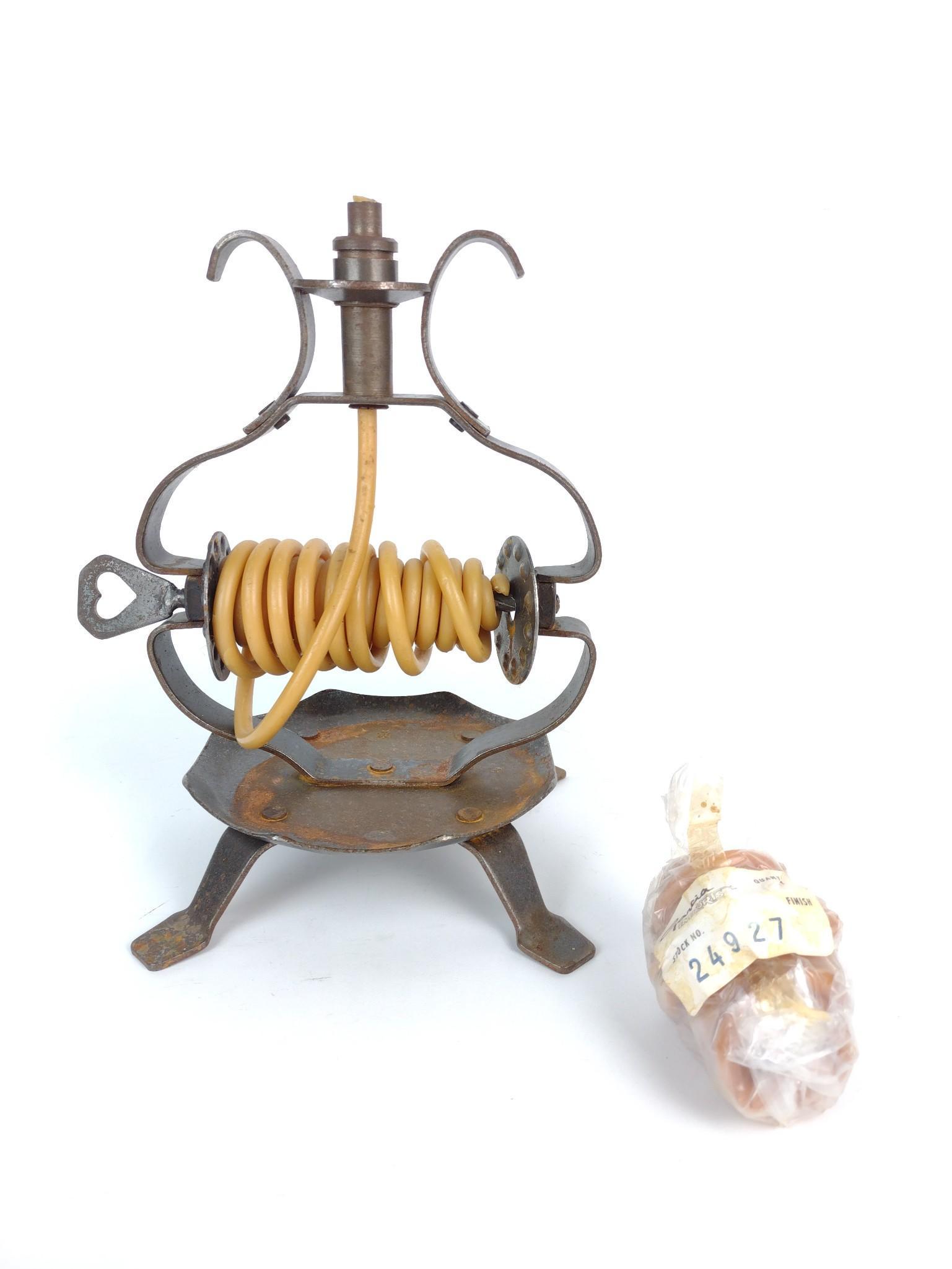 Vintage Candle By The Hour Holder: 8-1/2" wide X 10-1/2" high. Has some rust. No markings found. MG. IMPORTANT: Before bidding, please read the terms and conditions. When you registered for the auction you agreed to these terms and wil