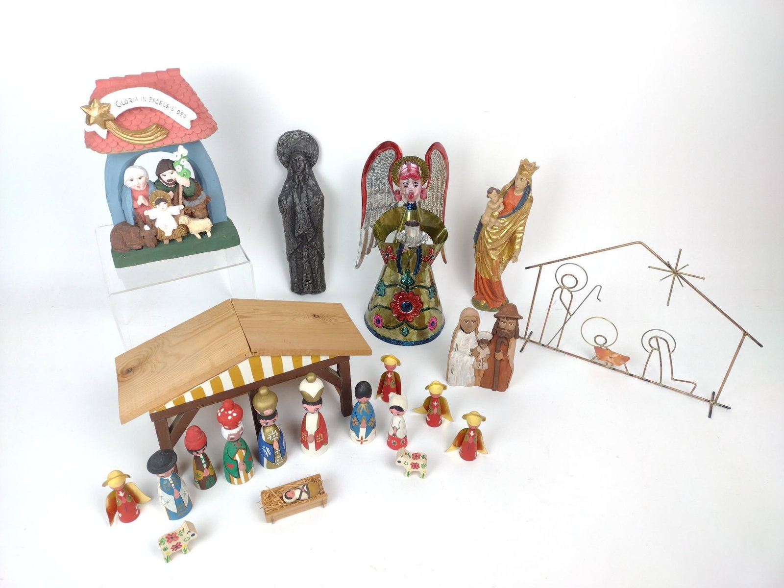 21 Pcs Christmas Collectibles Incl Nativity: Also includes angel tree topper, sculptures and more. 1-1/2" to 10" high. MG. IMPORTANT: Before bidding, please read the terms and conditions. When you registered for the auction you agreed to these t