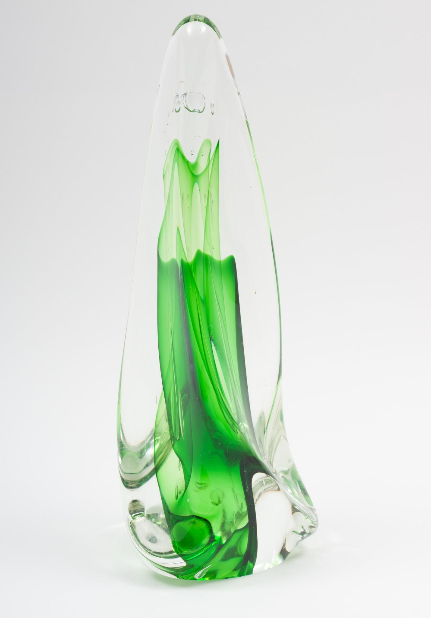 Rollin Karg (b. 1944, American, Kansas): DESCRIPTION: Green glass sculpture. Rollin Karg (b. 1944, American, Kansas). Blown glass. Signed around lower edge and dated 1996. Rollin Karg started life as an industrial engineer, photographer, pot