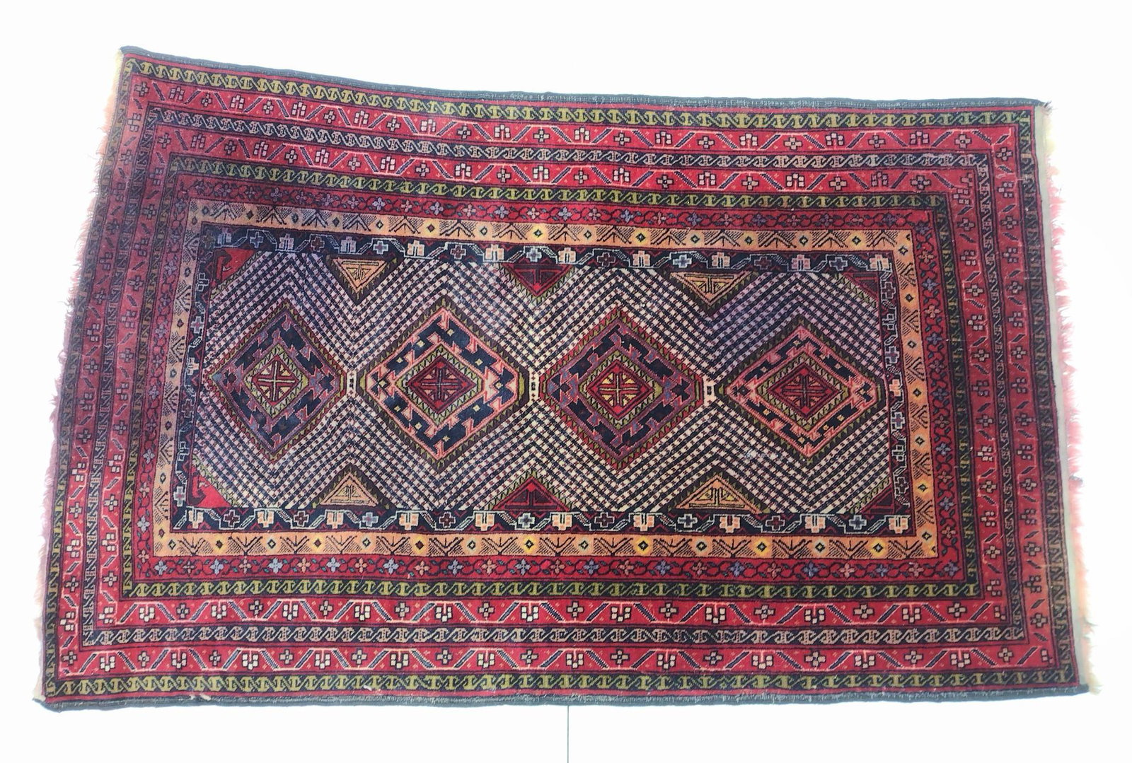 Iranian Tribal Area Rug: Hand Woven. Circa 1970s. 6'2" long X 3'8" wide. No. 4098. Has some dark areas. MG. IMPORTANT: Before bidding, please read the terms and conditions. When you registered for the auction you agreed to th