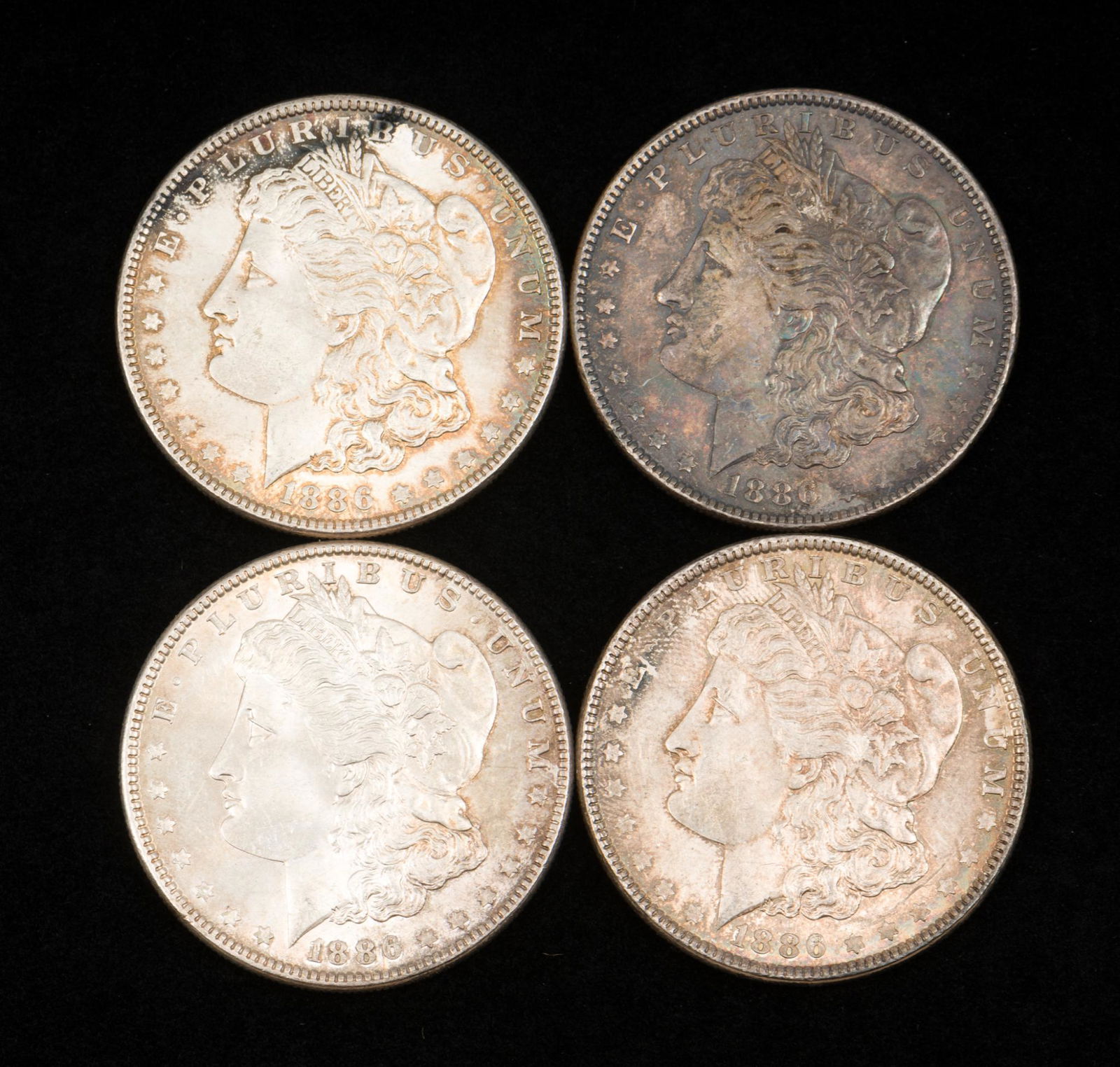 4 1886 Morgan Silver Dollars (1 of 2)