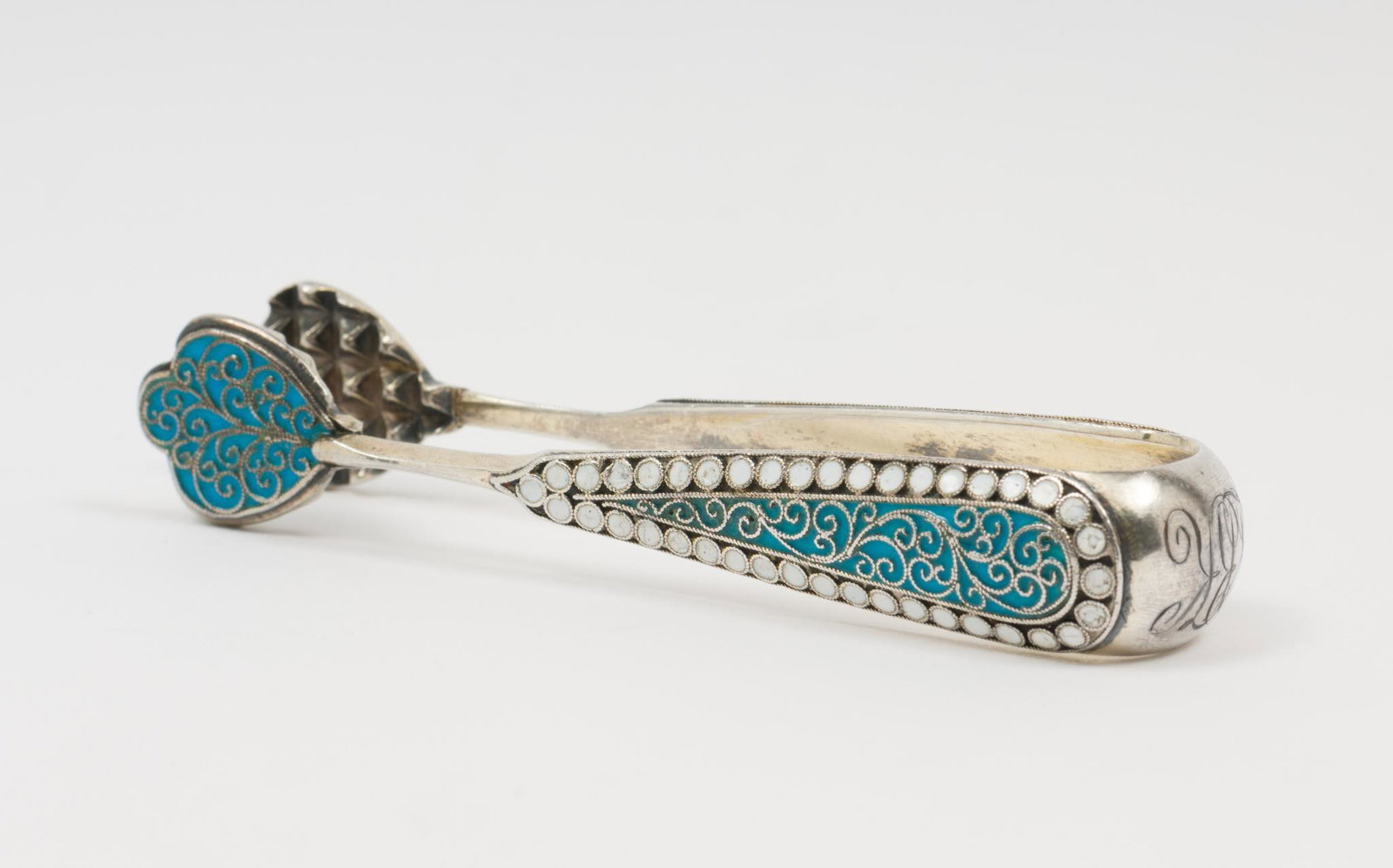 19th C Russian Enamel Sugar Tongs: Enameled. Marked 64 with Moscow hallmark and G.K., probably G. Komarnitsky, 1860-1890. 3-3/8" long x 3/4" width at top. DC/ML IMPORTANT: Before bidding, please read the terms and conditions. When you 