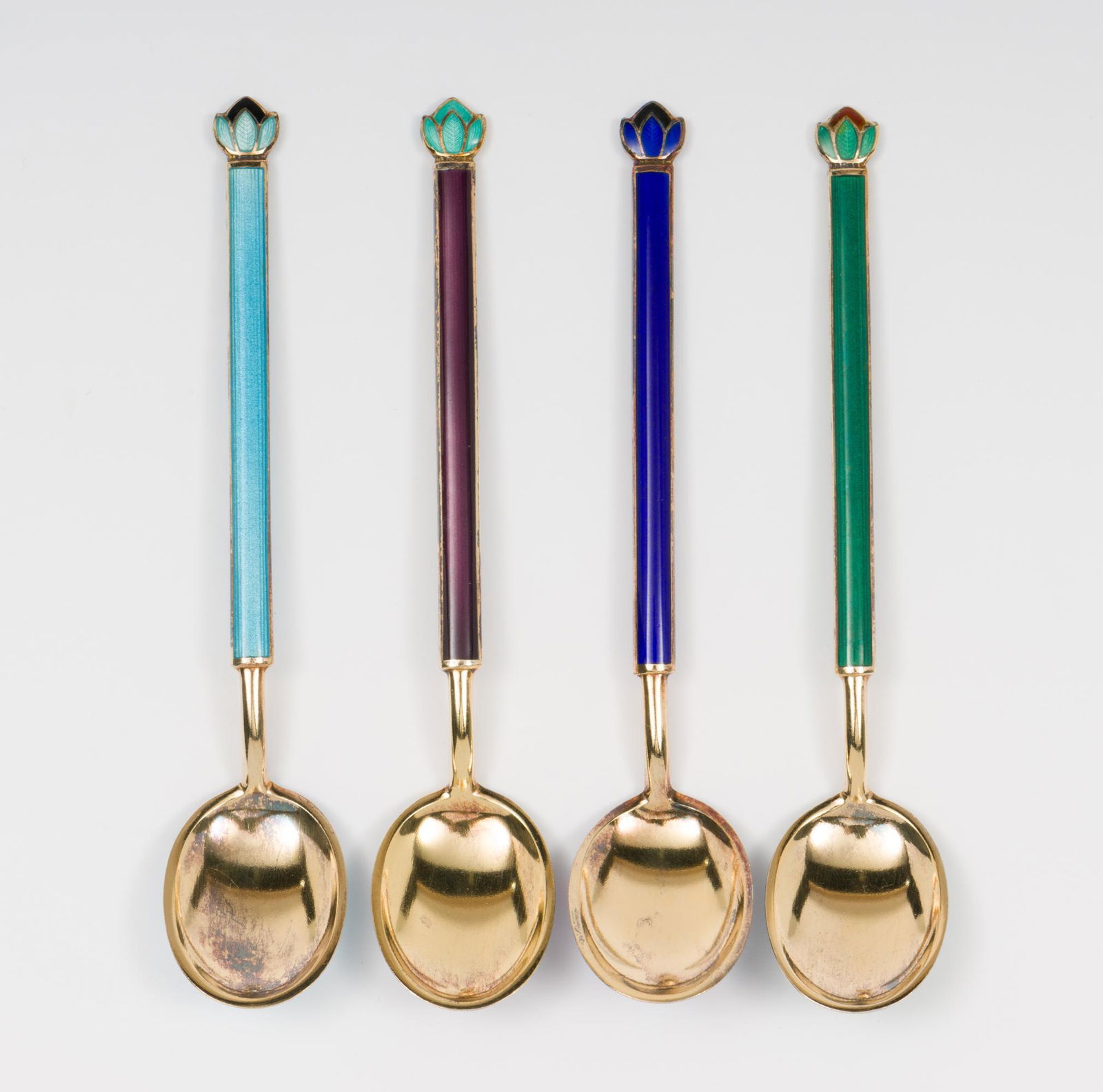 D.A. Norway Sterling Demitasse Spoons: Set of four sterling and enamel demitasse spoons. Signed D. Anderson for David Anderson, Norway. Marked sterling. 3-3/4" length. DC/ML IMPORTANT: Before bidding, please read the terms and conditions.