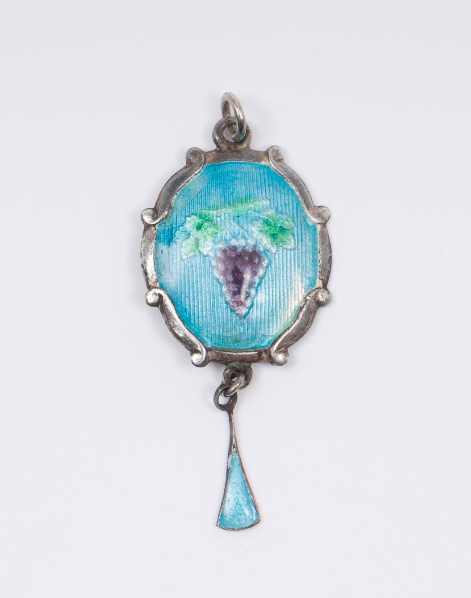 Sterling and Enamel Pendant: Sterling pendant with enamel grapes and drop. 1-1/4" high. EK/ML IMPORTANT: Before bidding, please read the terms and conditions. When you registered for the auction you agreed to these terms and will