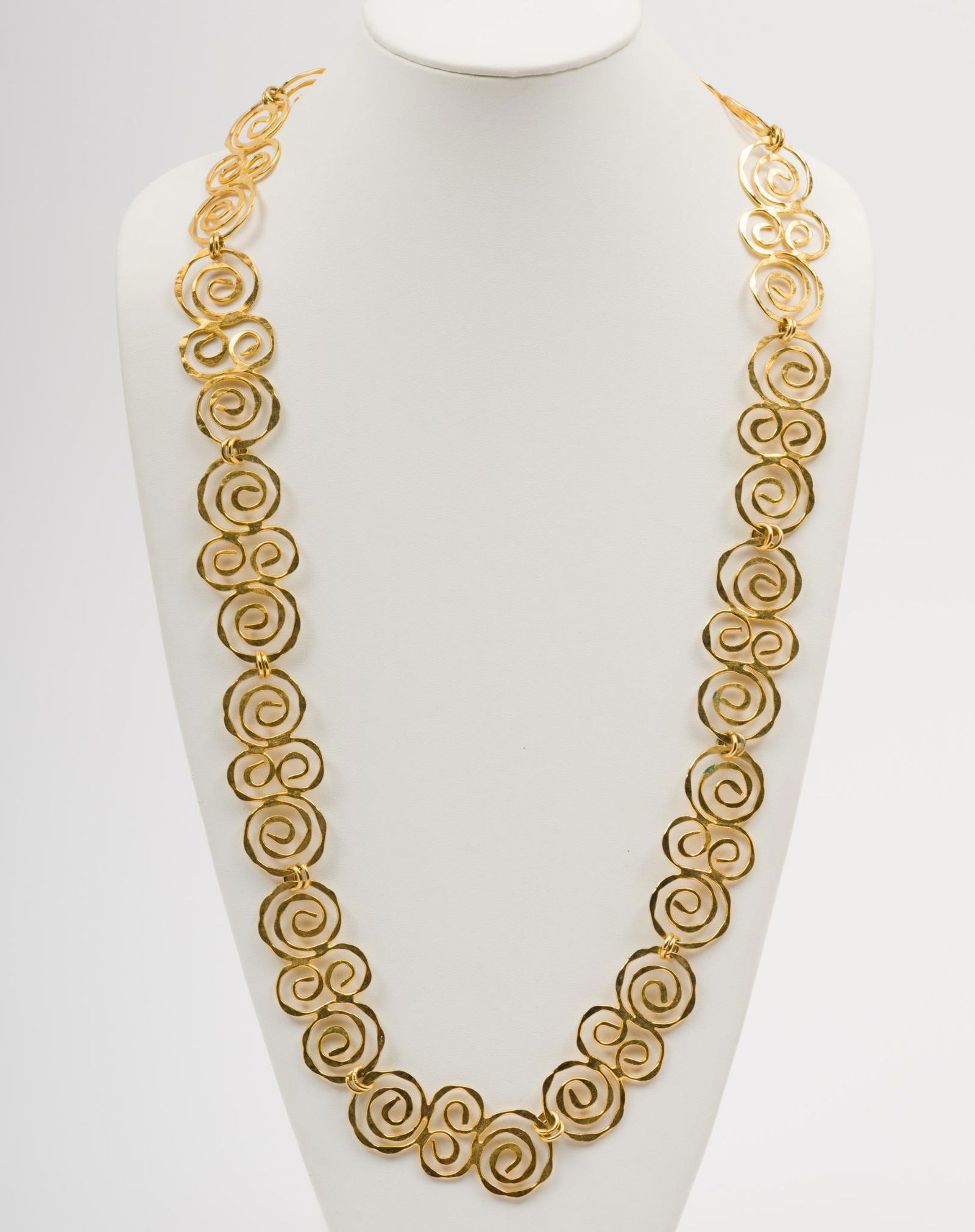 Modernist Gold Toned Belt: 36" Length. 1" wide. DC/ML IMPORTANT: Before bidding, please read the terms and conditions. When you registered for the auction you agreed to these terms and will be required to comply with them.