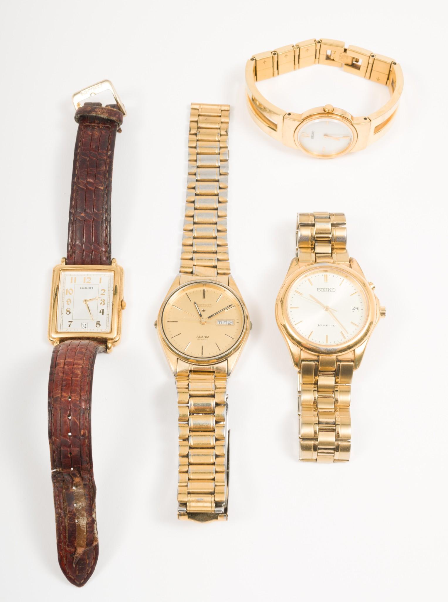 4 Seiko Wrist Watches: Two gentleman's and two ladies. 1-1/8" to 1-1/2" lug to lug. On 7-8" adjustable bands. AJ/MH IMPORTANT: Before bidding, please read the terms and conditions. When you registered for the auction you ag