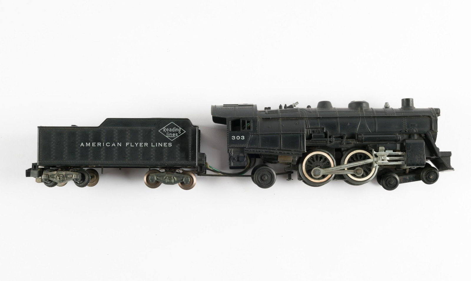 American Flyer 303 Steam Engine and Reading Lines Tender: Both have been run. LR IMPORTANT: Before bidding, please read the terms and conditions. When you registered for the auction you agreed to these terms and will be required to comply with them.