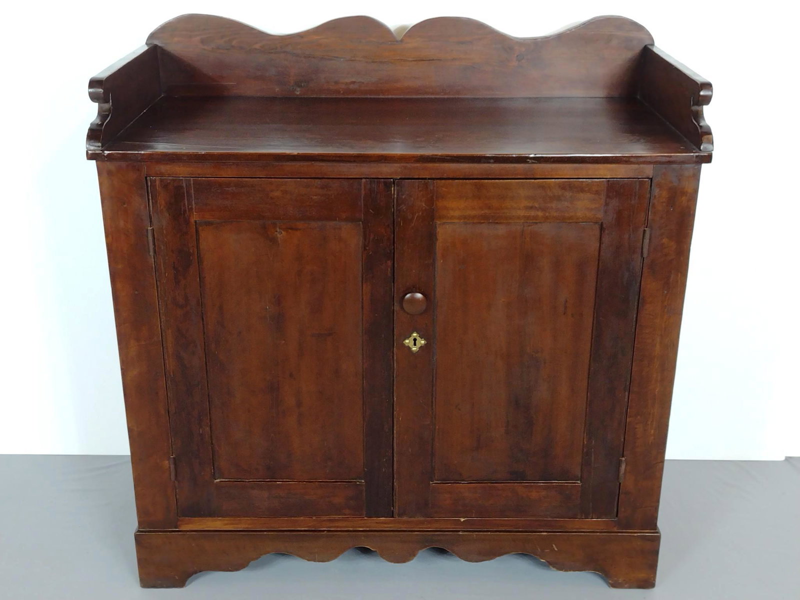 Jelly Cupboard: 41-1/4" wide X 19-1/2" deep X 42" high. Top has some splits. Also has scratches. MG. Provenance: From the estate of Mary Trost who last resided in the multi generational family home located in Clarks 