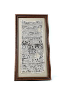 1827 Rebecca P. Wilson Needlepoint Sampler: Overall with frame 20-3/4" high x 10-3/4" wide. Rebecca was the maternal grandmother of Mary C. Stackpole and Daughter of Mary Henderson. Two holes in sampler. LR Provenance: From the estate of Mary T