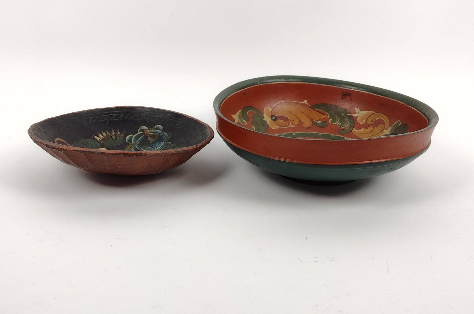 2 Painted Wood Bowls: 9" to 11-1/4" diameter X 2-1/2" to 3-1/2" high. Some paint losses. MEG Provenance: From the estate of Mary Trost who last resided in the multi generational family home located in Clarks Valley, Dauphi